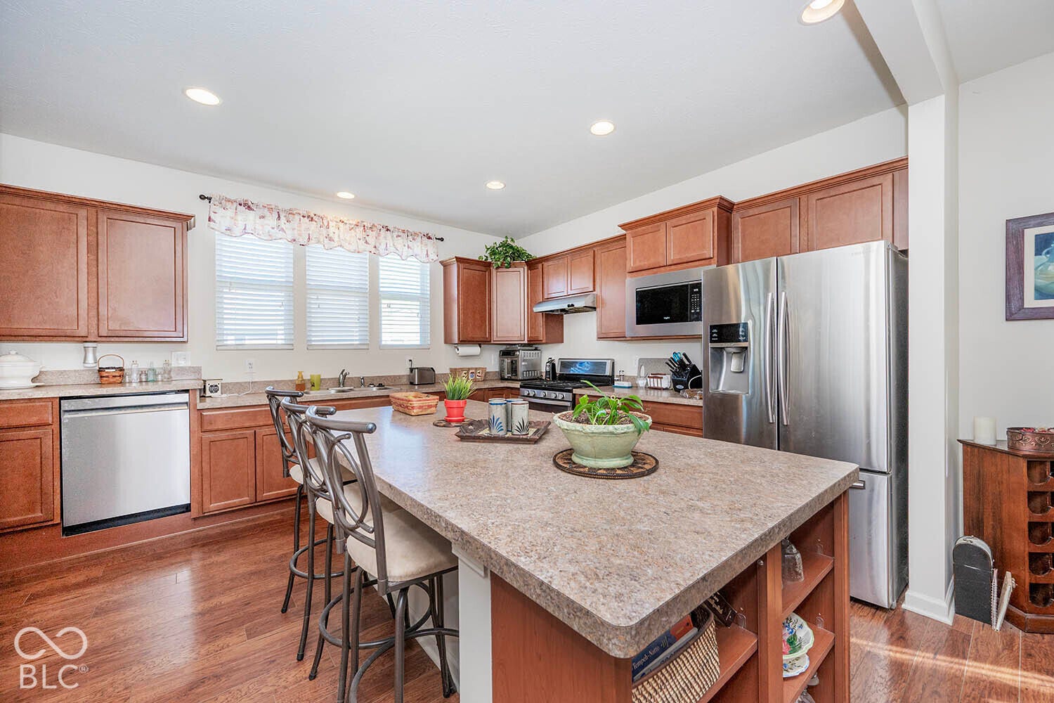 View of the 15' by 14' kitchen. Note that NEW purchases and kitchen updates in the past 4 months include a KitchenAid Dishwasher, Microwave, and Garbage Disposal.