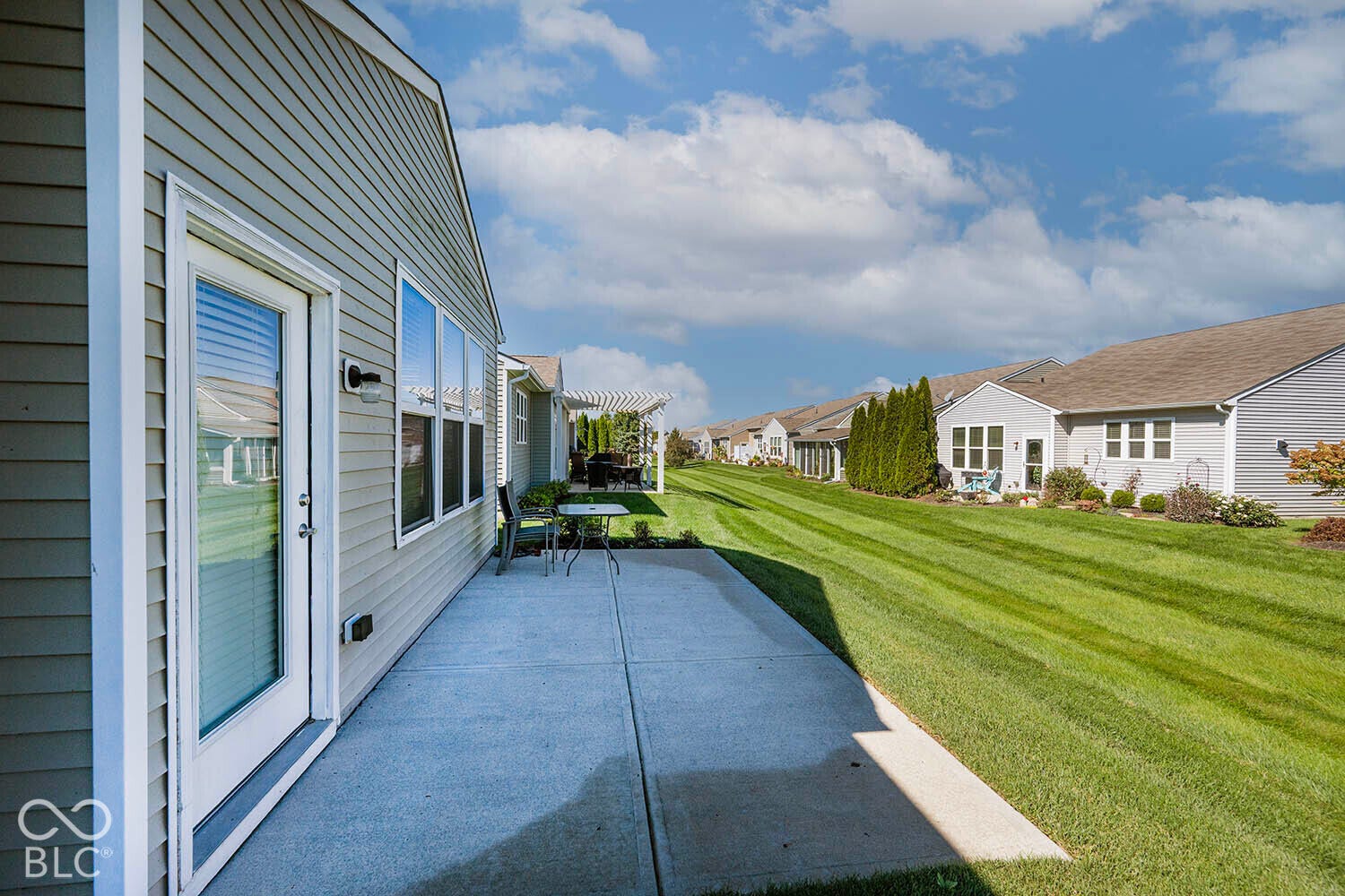Enjoy mornings or evenings on the 19' by 10' concrete patio. There is a gas connection from the home for your gas grill.
