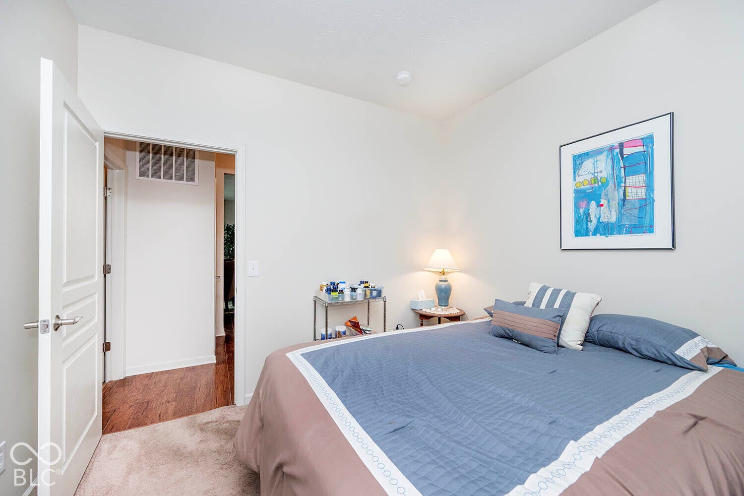 Bedroom #2 has carpeted flooring, white walls, and a recessed ceiling light