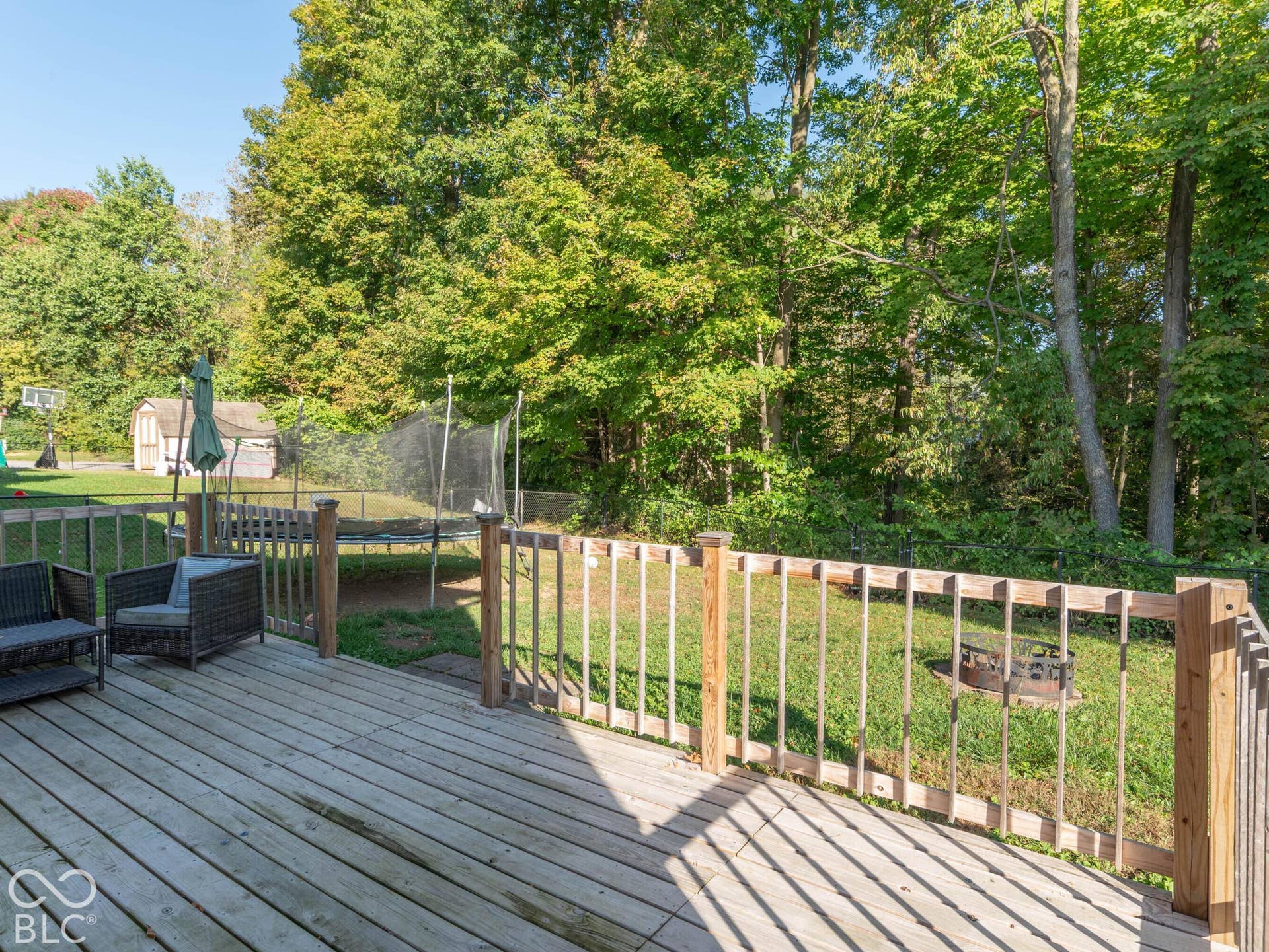 Expansive wood deck with a perimeter railing