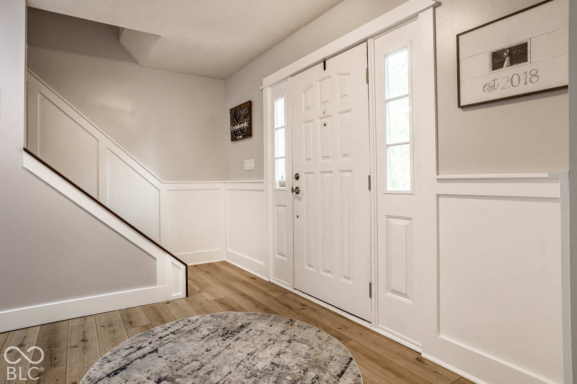 Spacious Entry w/Chair Rail & Picture Frame Trim Detail!