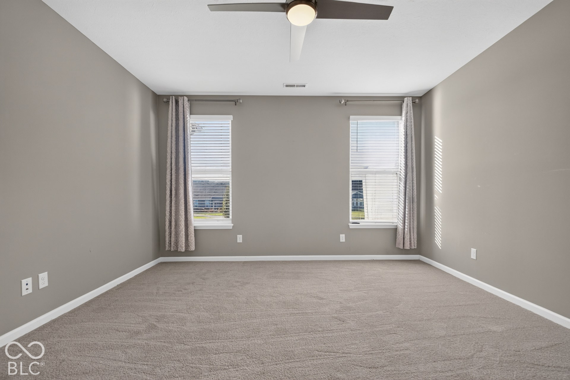 Primary bedroom with brand new carpet.