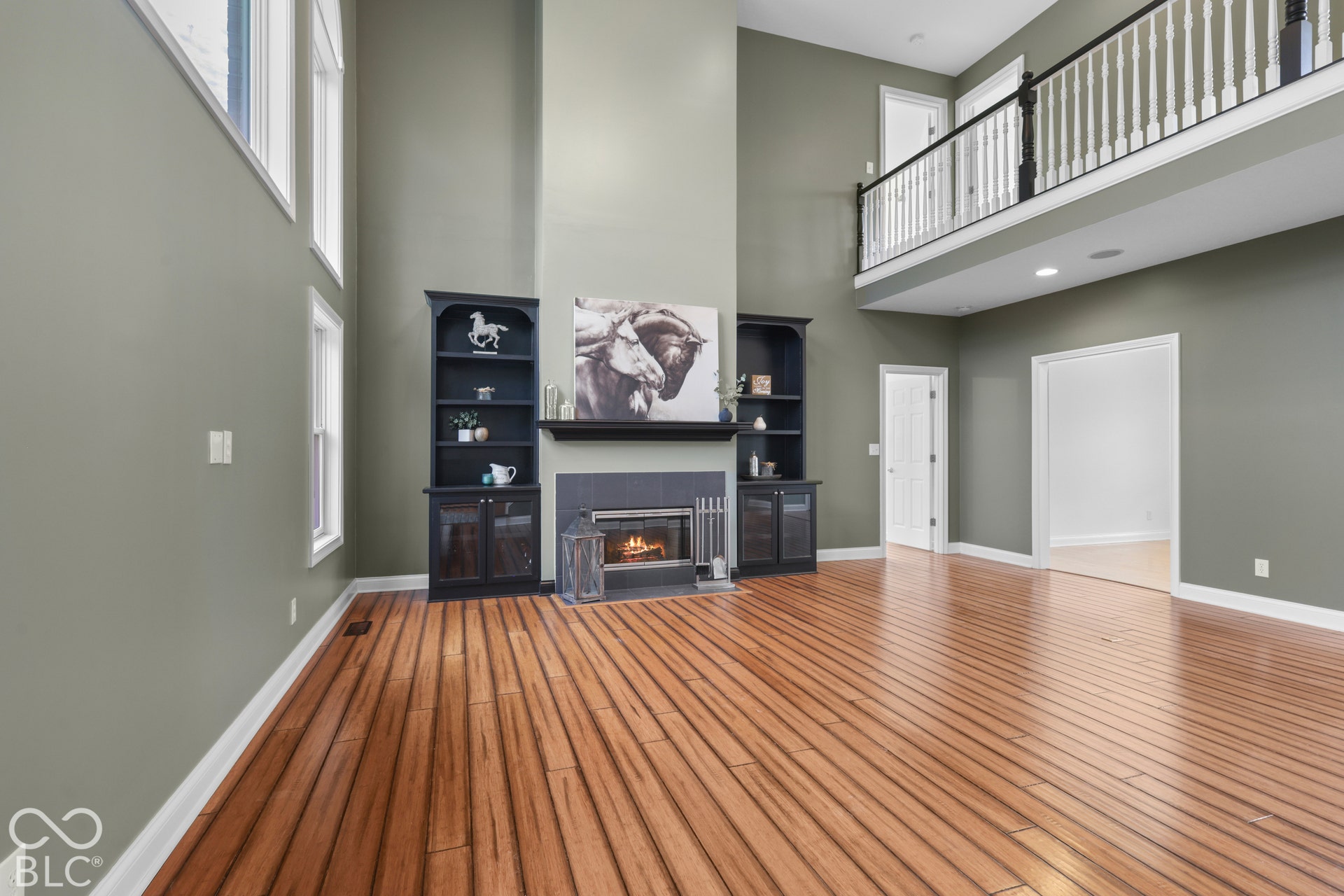 5976 E Holes Crossing Drive, Crawfordsville, IN 47933 GREAT ROOM WITH VAULTED CEILINGS, WOOD BURNING FIREPLACE AND BAMBOO FLOORS