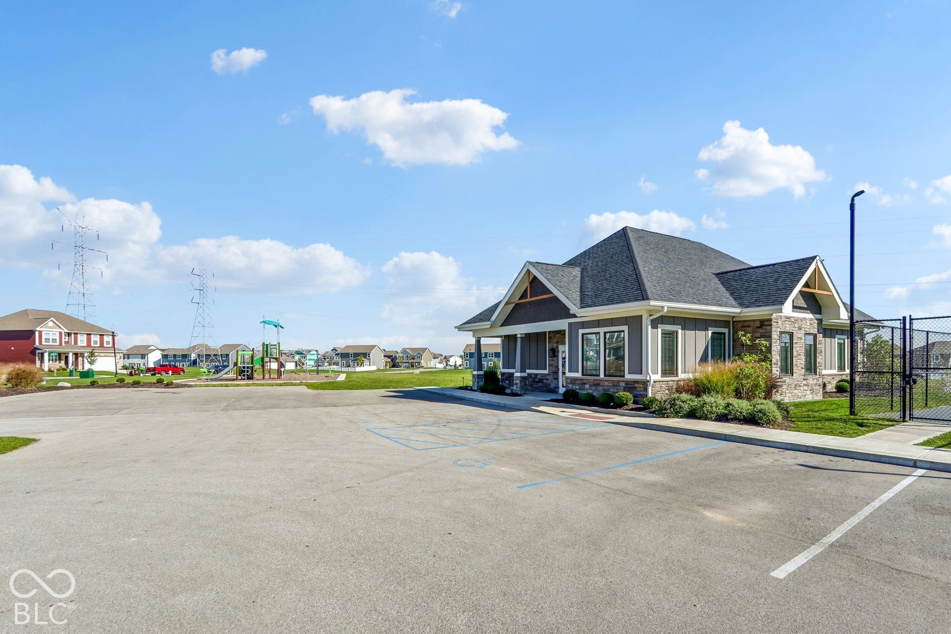 Edgewood Farms Community Clubhouse with paved parking area