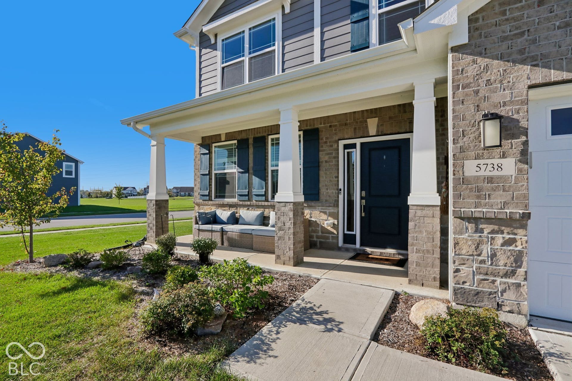 Full front porch with craftsman columns