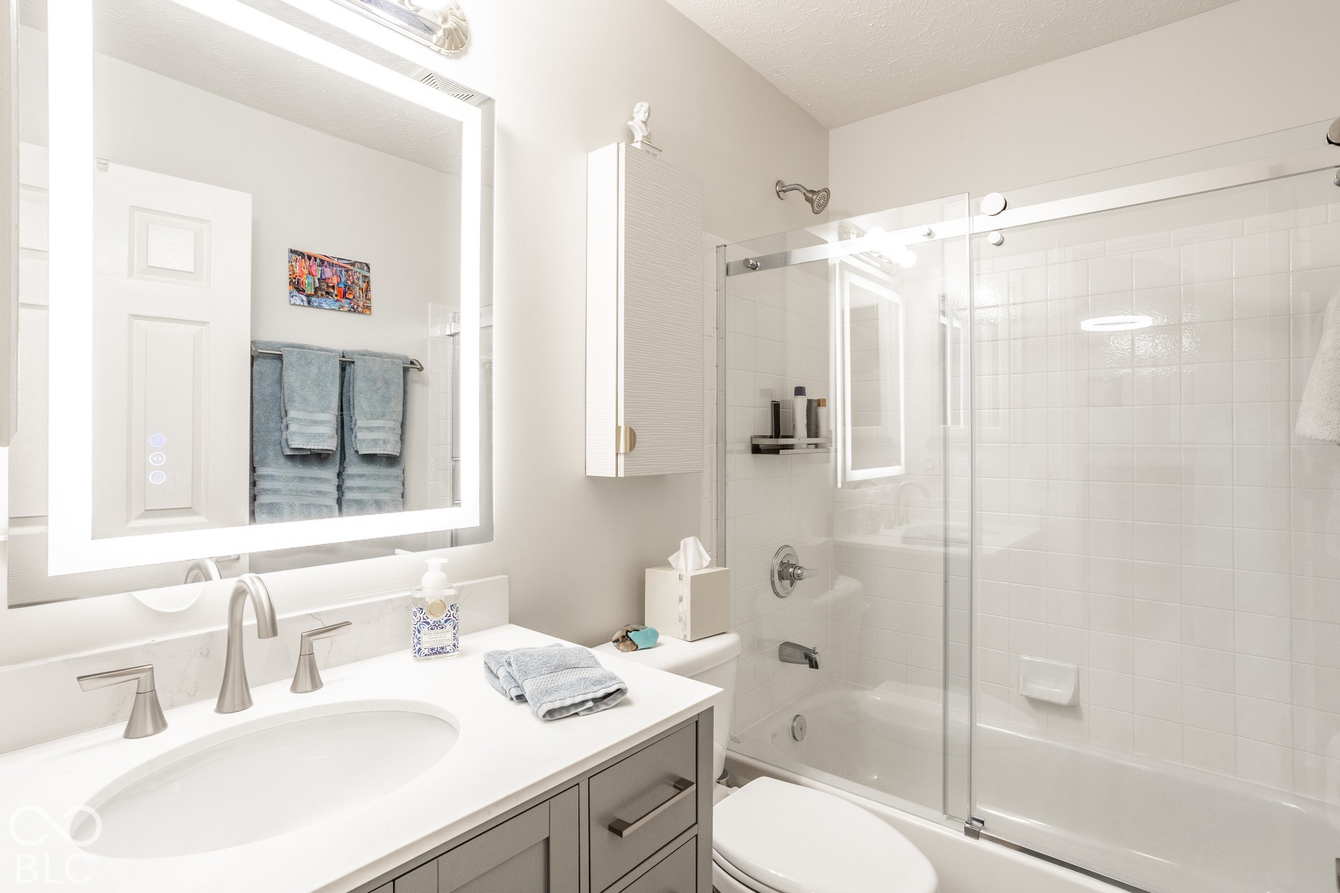 New Quartz vanity & faucet, shower glass door & mirror