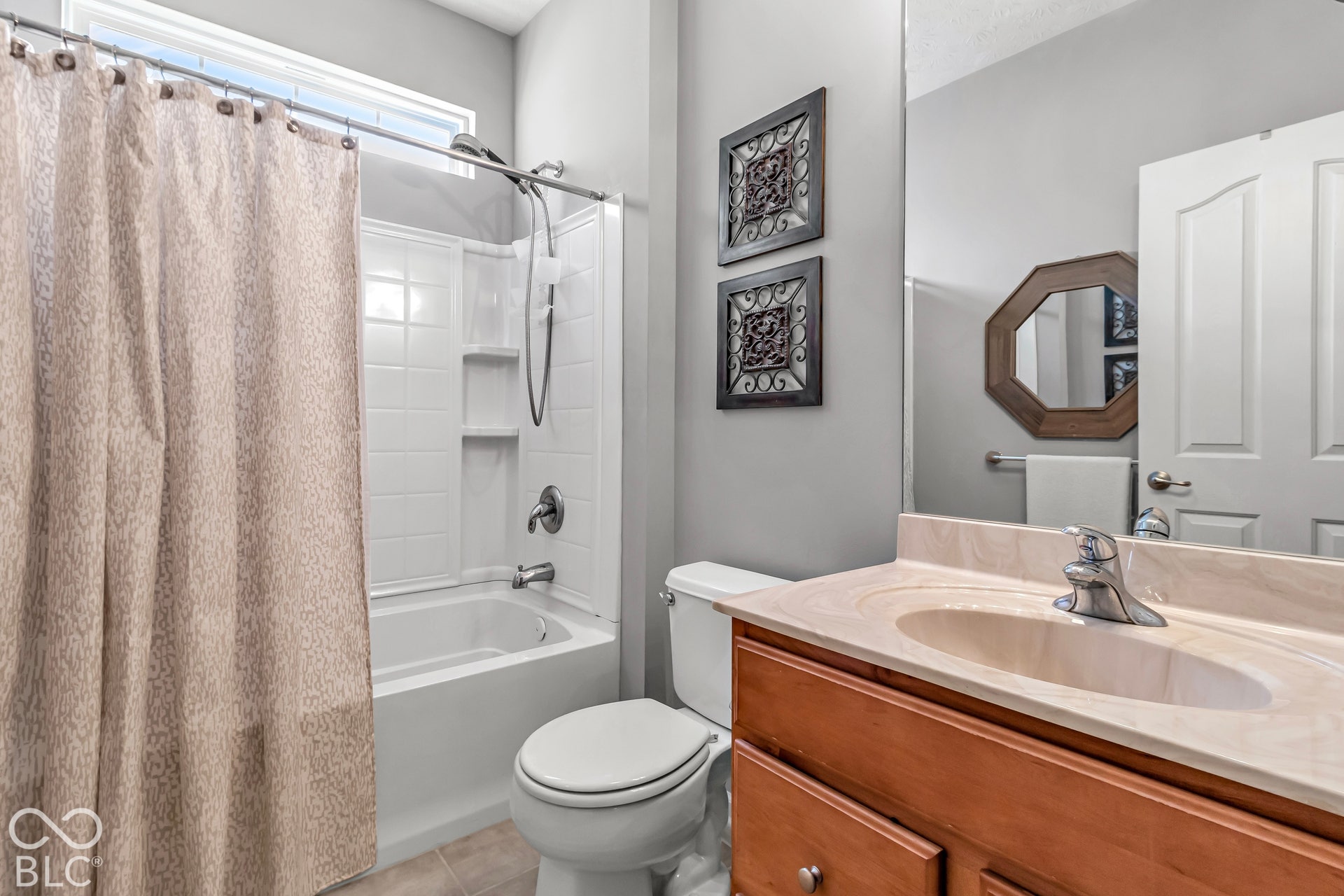 The hallway bathroom is located right next to Bedroom #2 and offers an ensuite type feel.