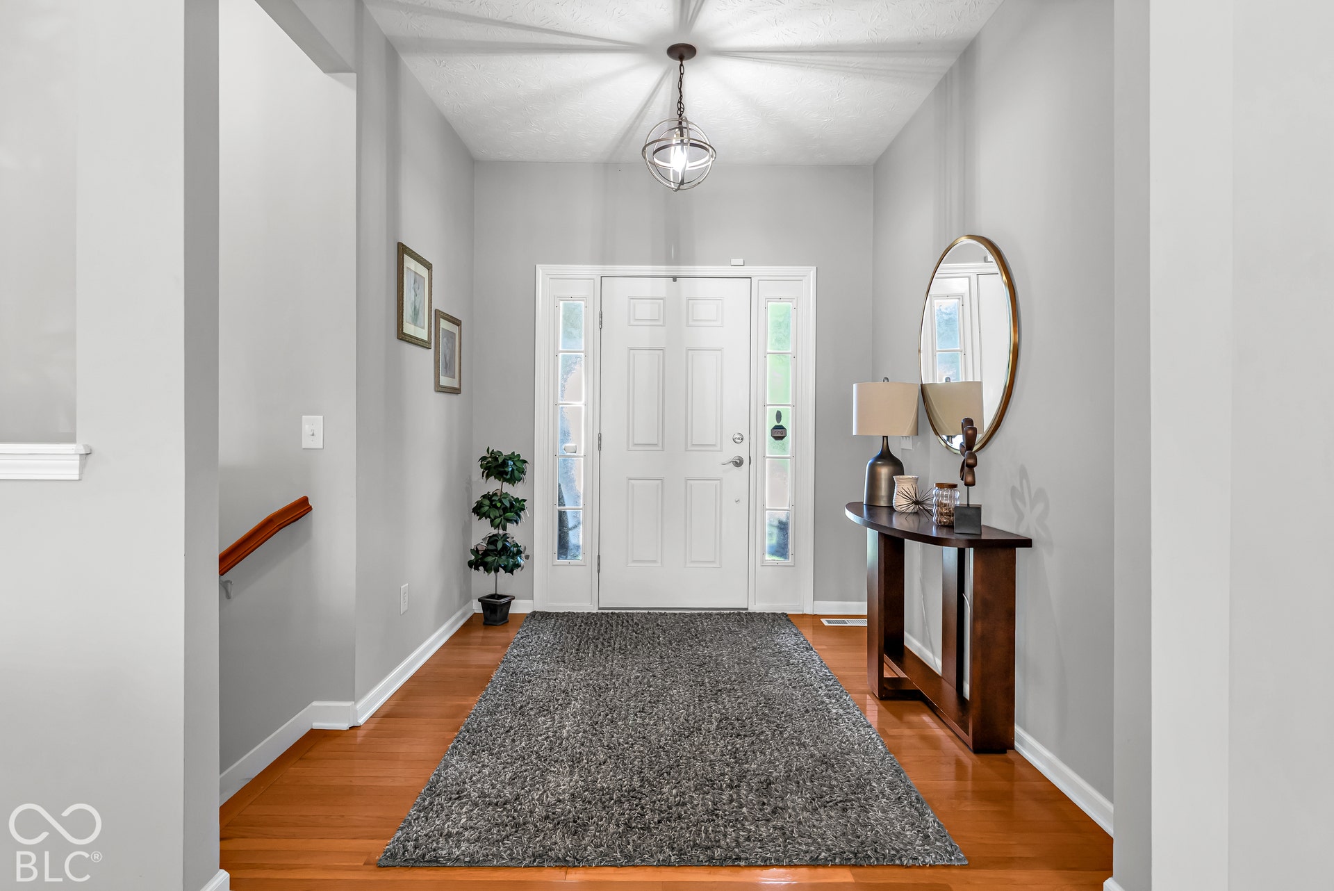 The stairs to the basement are just off the foyer.