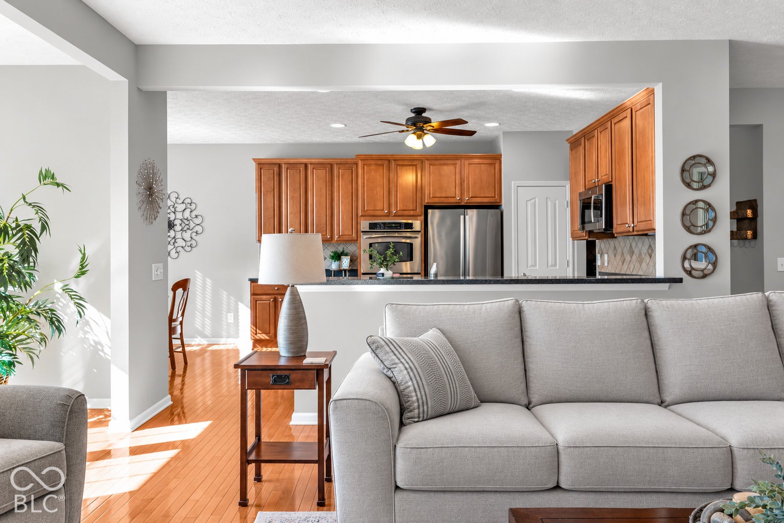 The kitchen features plenty of counter space for additional bar stool seating.