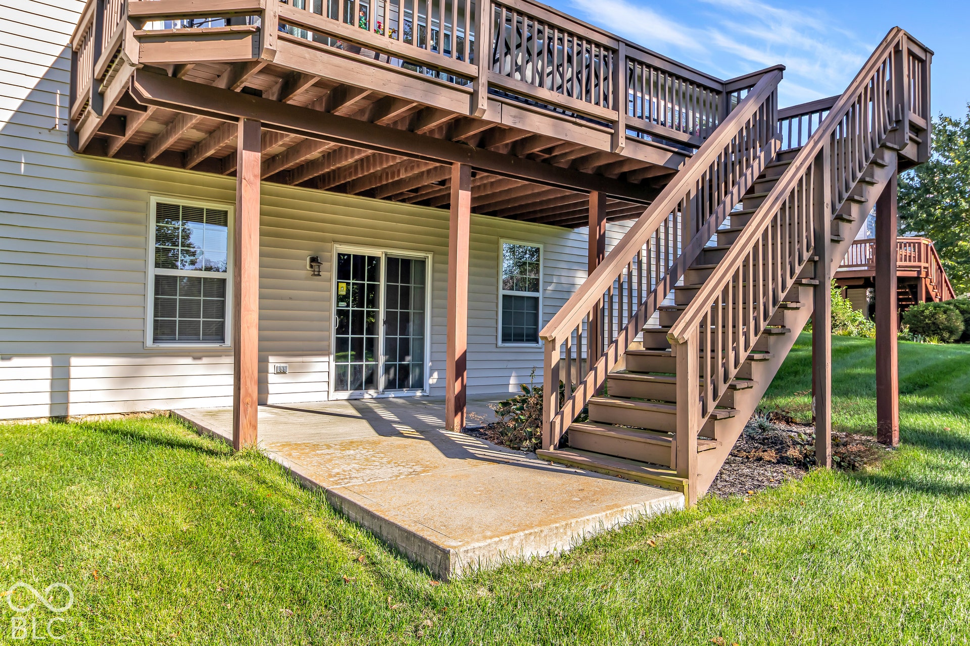 The oversized lower level patio offers a covered space for relaxing just off the basement doors.