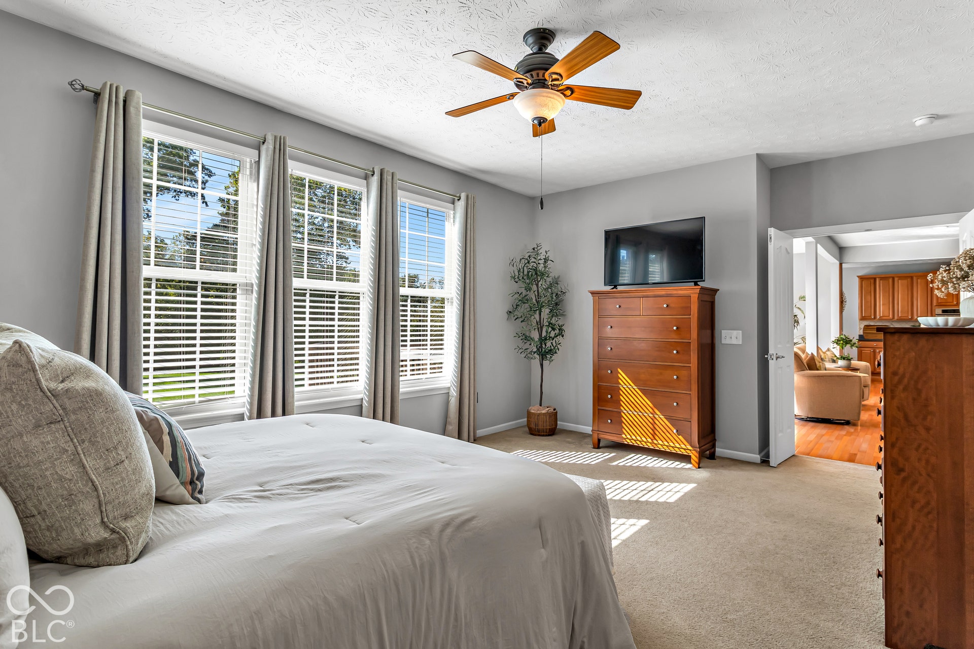 The suite features three large windows that also overlook the serene backyard views!