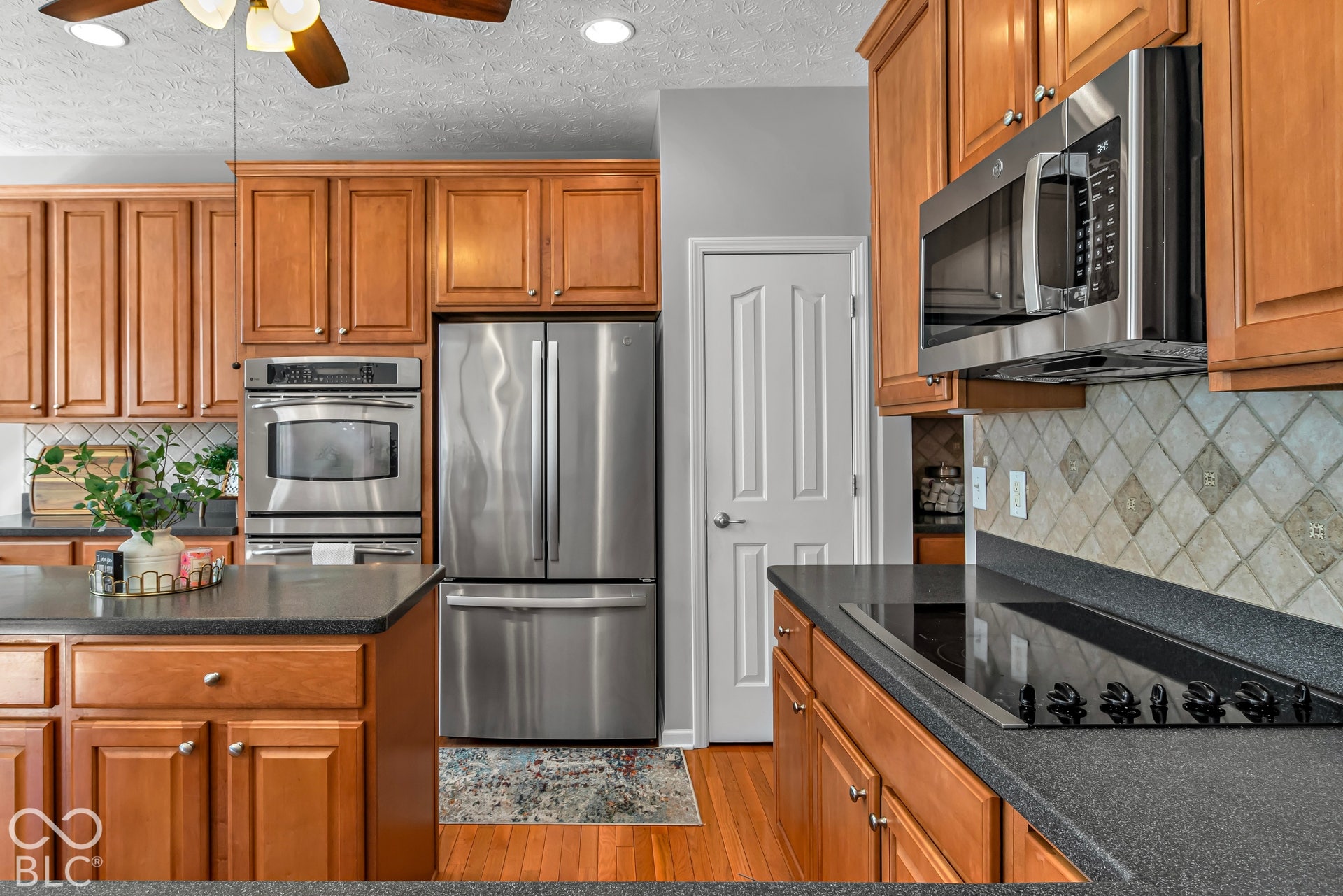 All stainless steel appliances stay with the home.