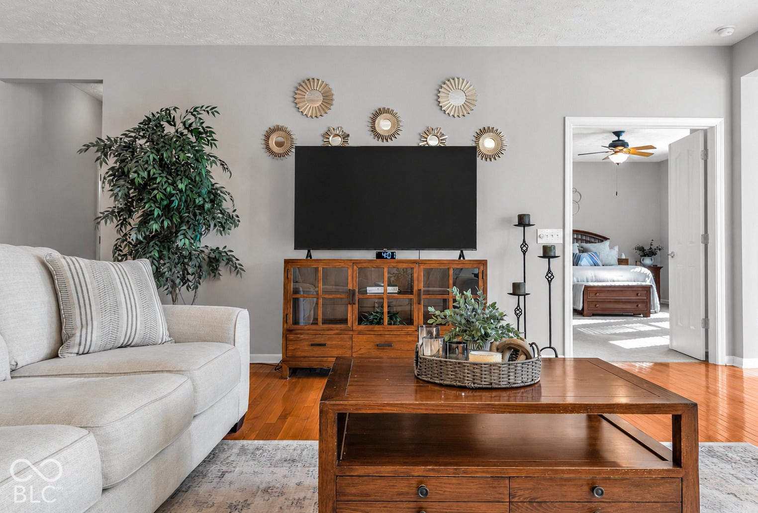 The primary suite is located just off the cozy living space.