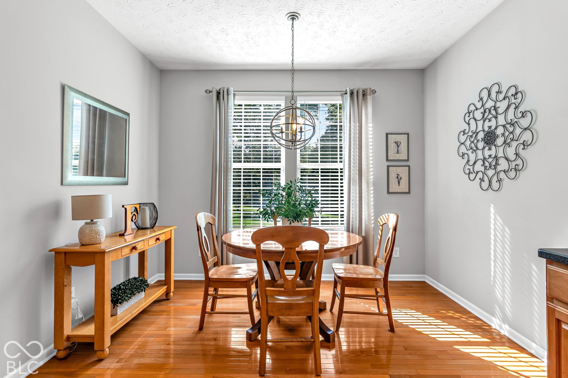 A bright breakfast nook offers plenty of space for additional seating.