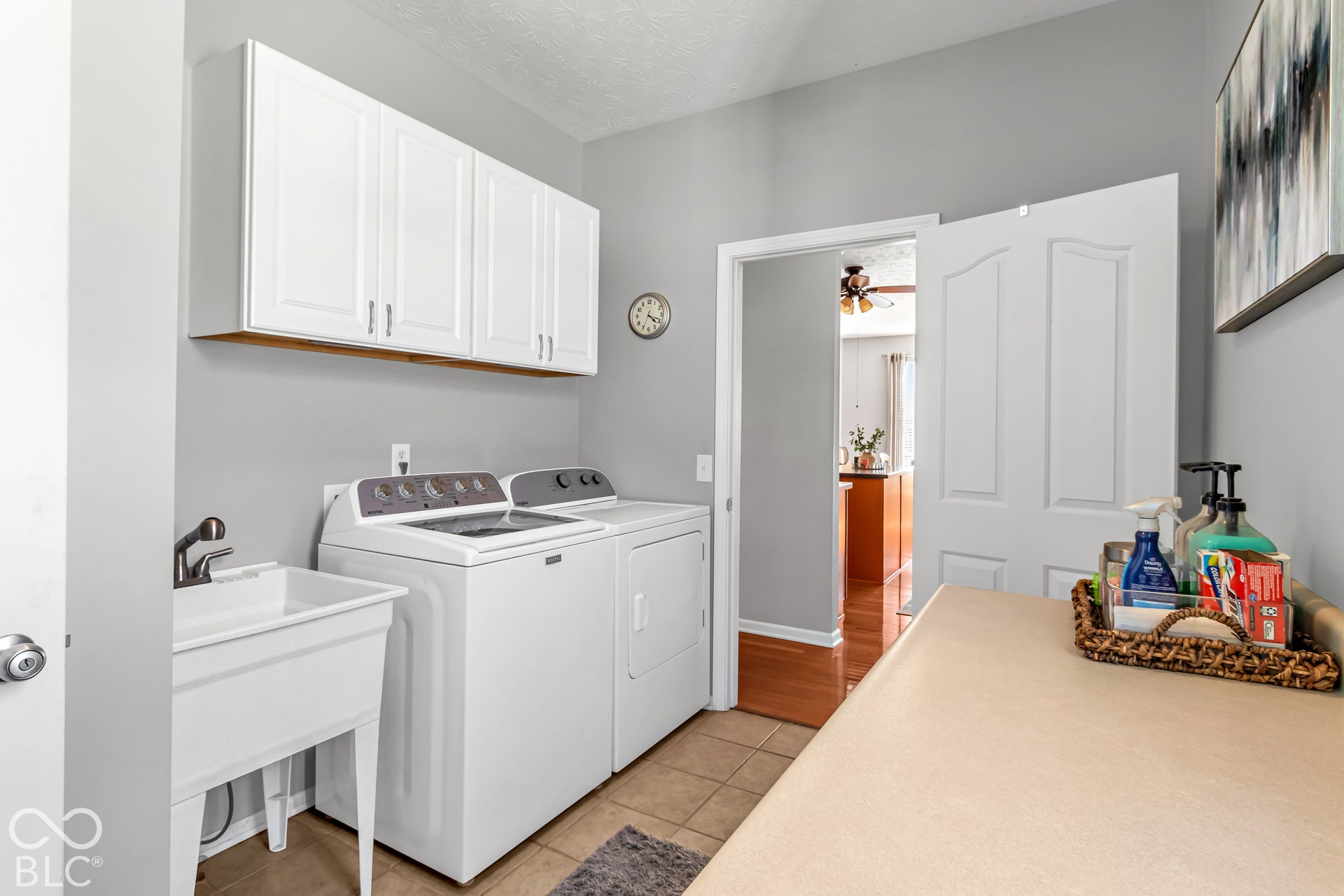 The laundry also features a utility sink!