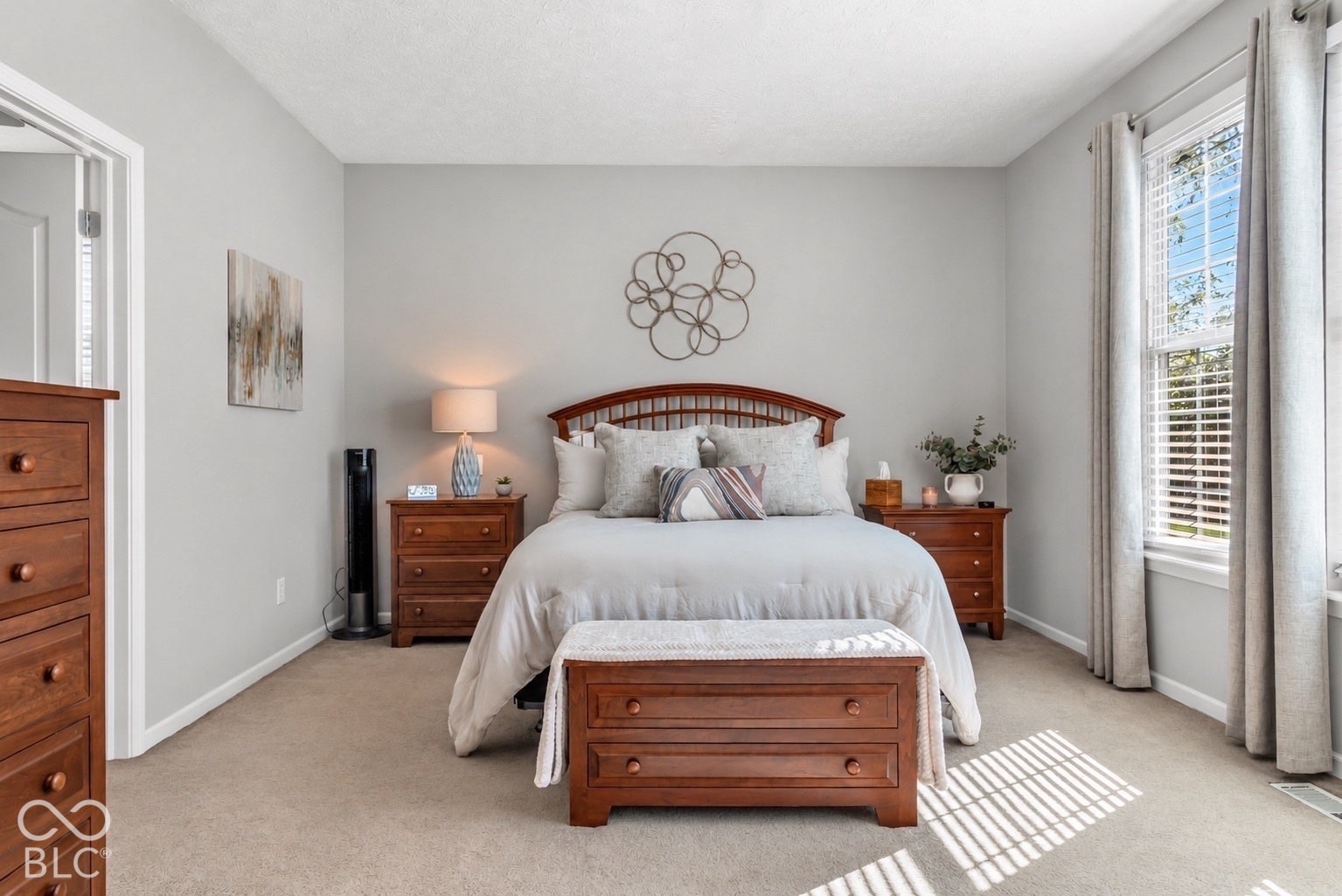 Double doors lead to the welcoming primary suite!