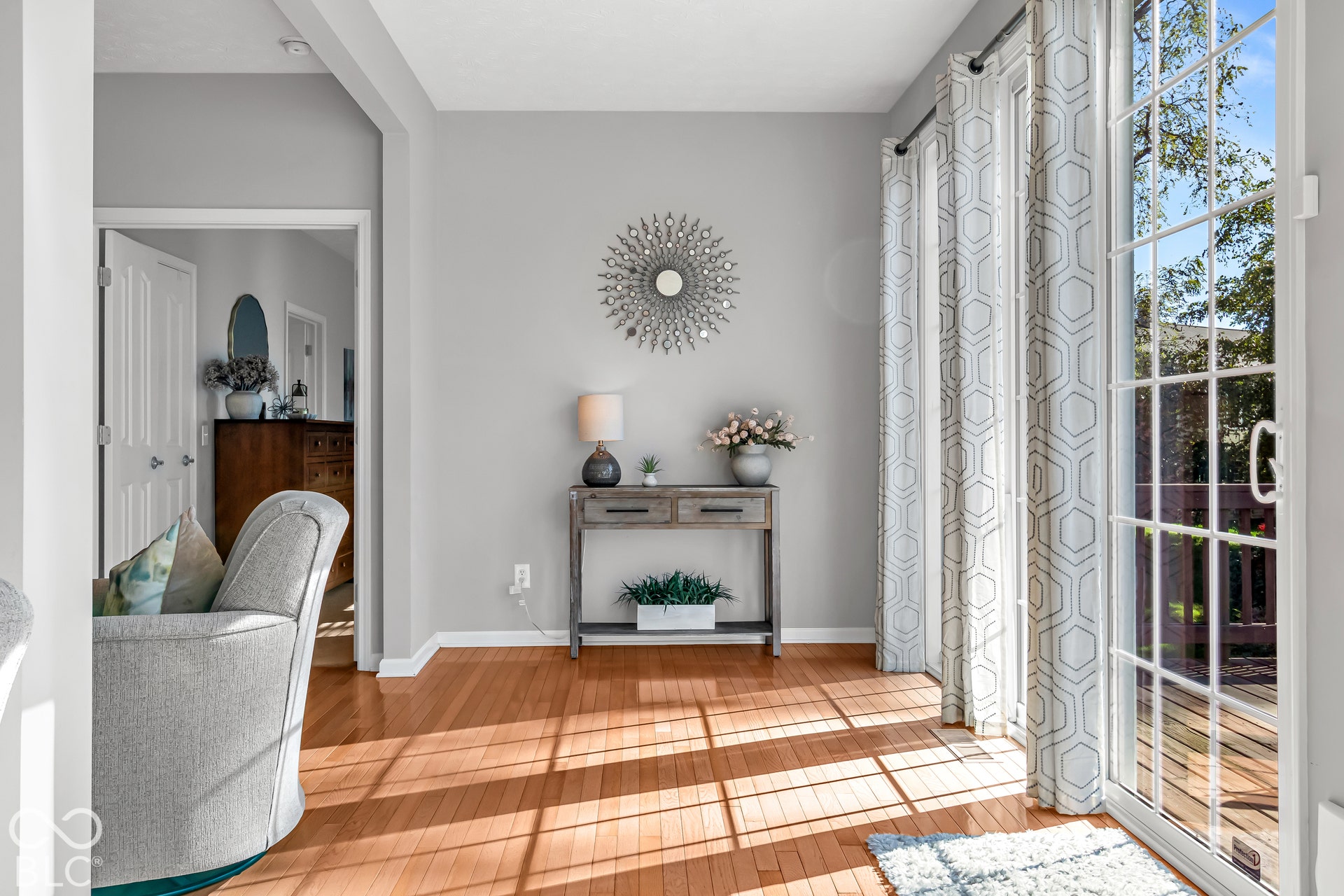 Sliding doors from the sunroom lead to the large deck.