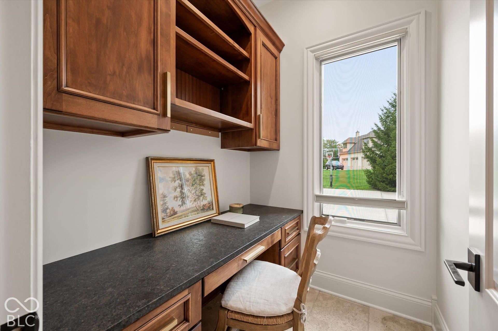 Custom built-in desk with integrated shelving and cabinetry
