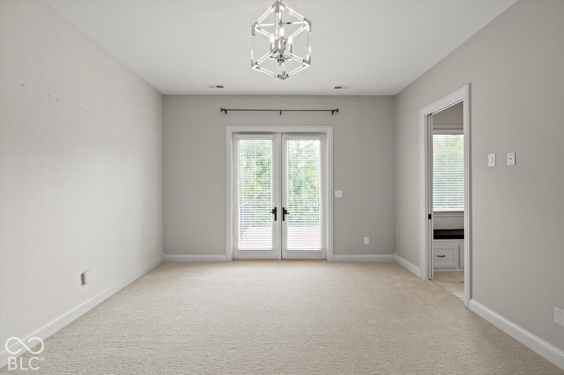 Neutral-toned carpeting throughout