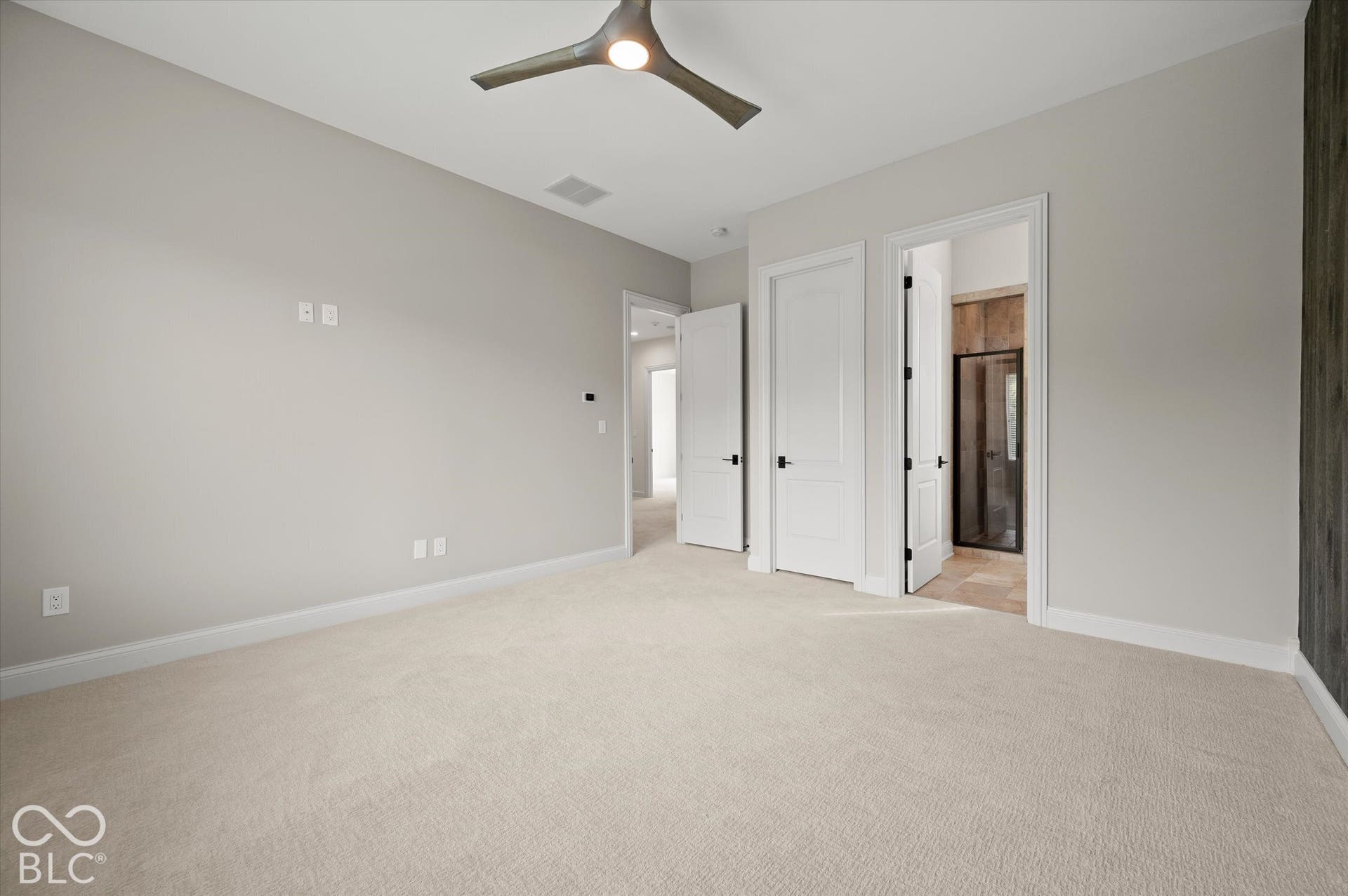 Recessed lighting, ceiling fan, neutral wall tones, white trim, and light-toned carpeting