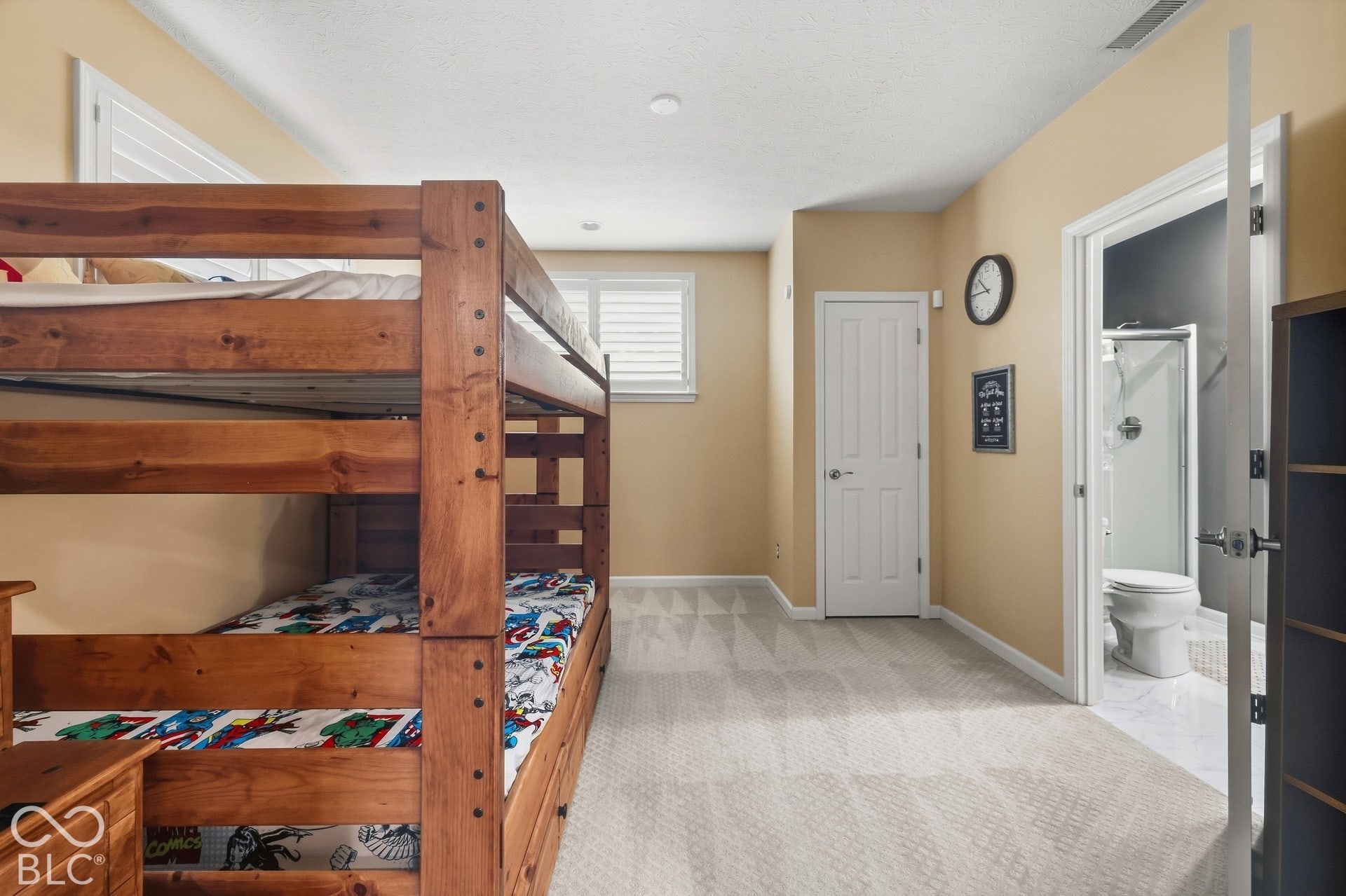 Bedroom 6 in the lower level featuring attached full bath