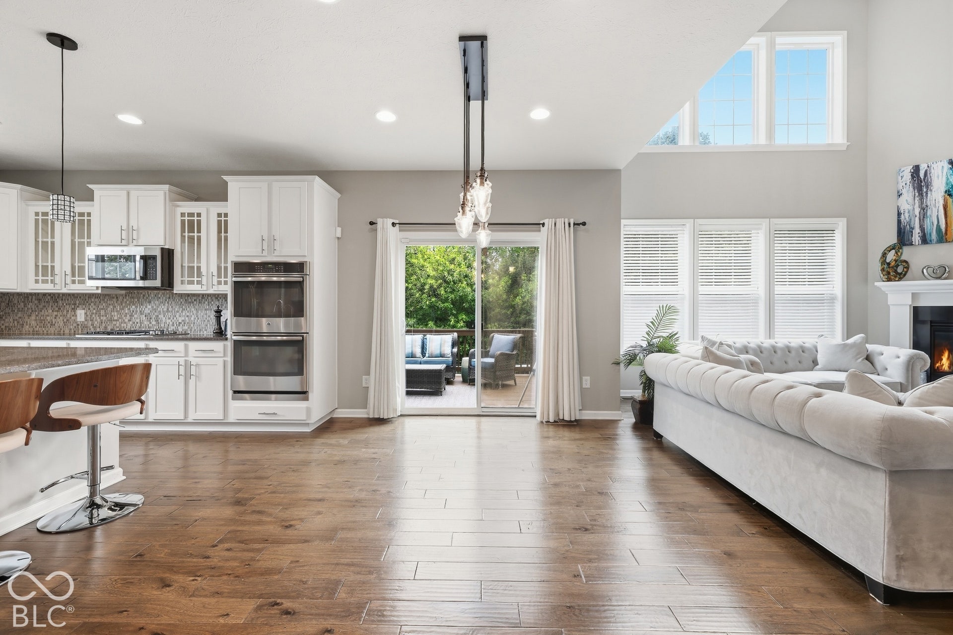 Breakfast area leads to a large deck overlooking the private treeline