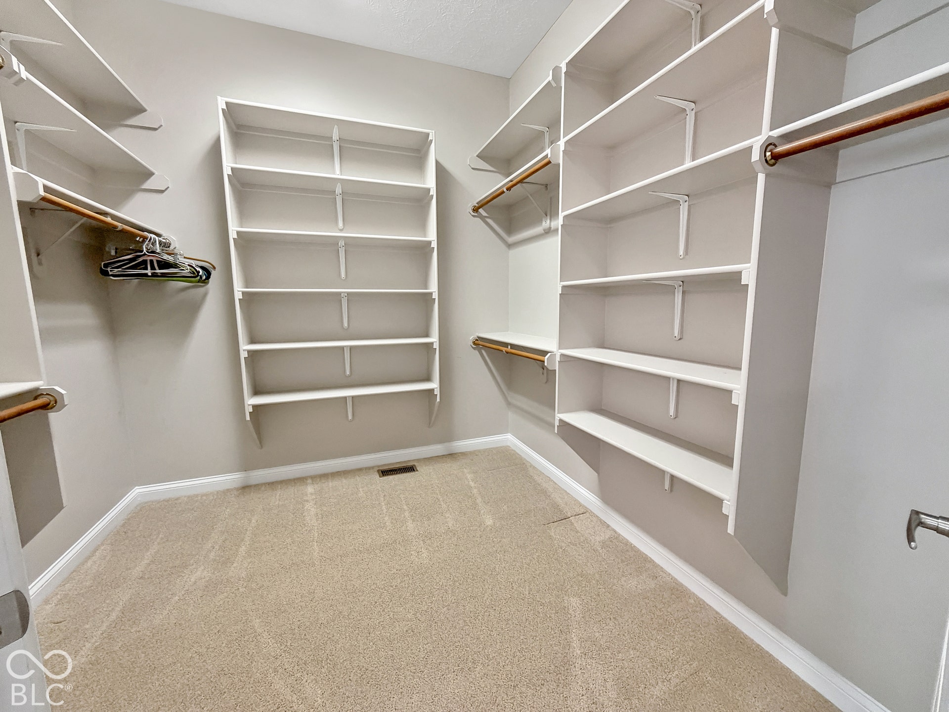 Walk in closet located in Master bathroom