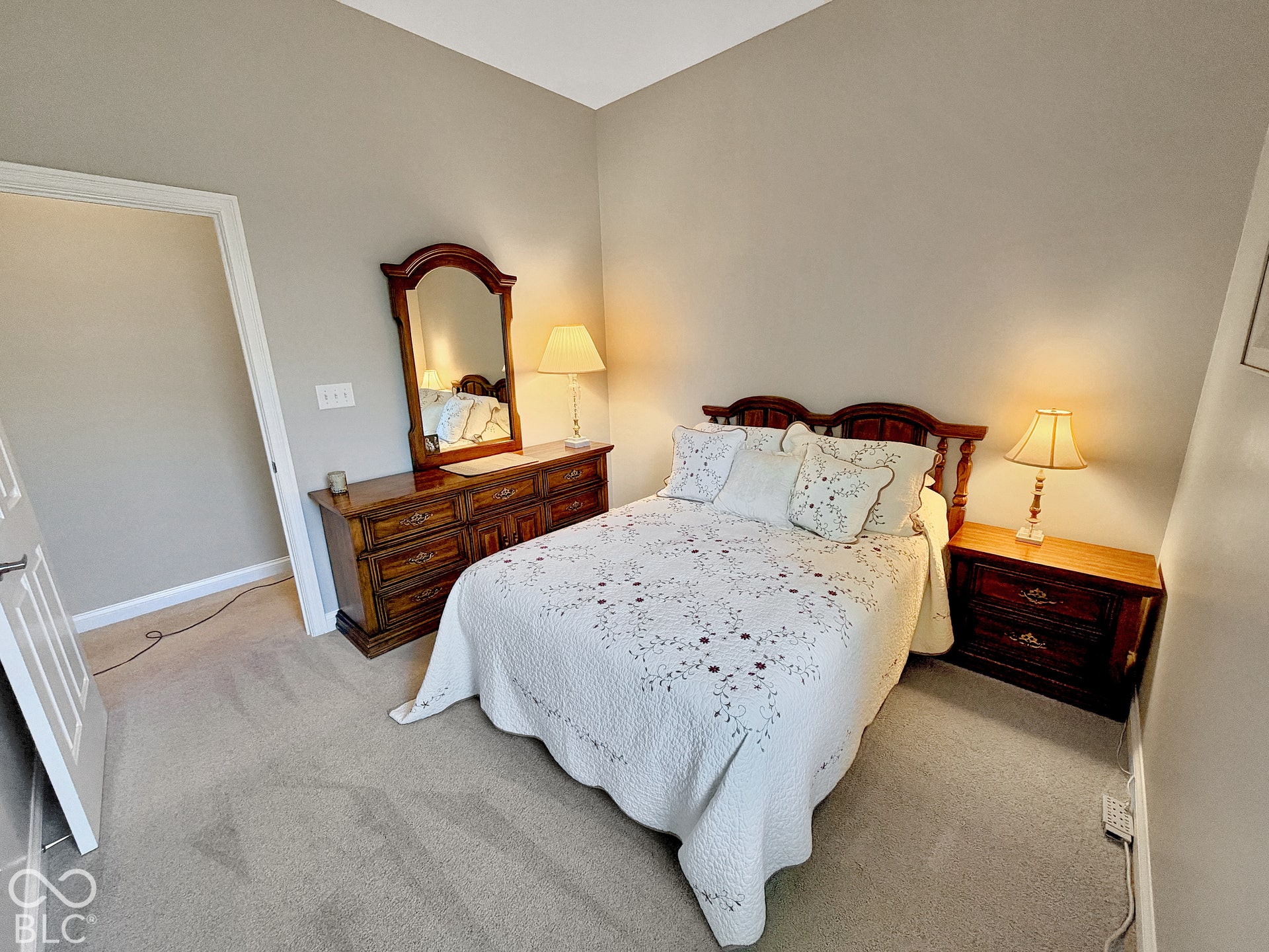 Bedroom 2 with Neutral tone wall finishes.