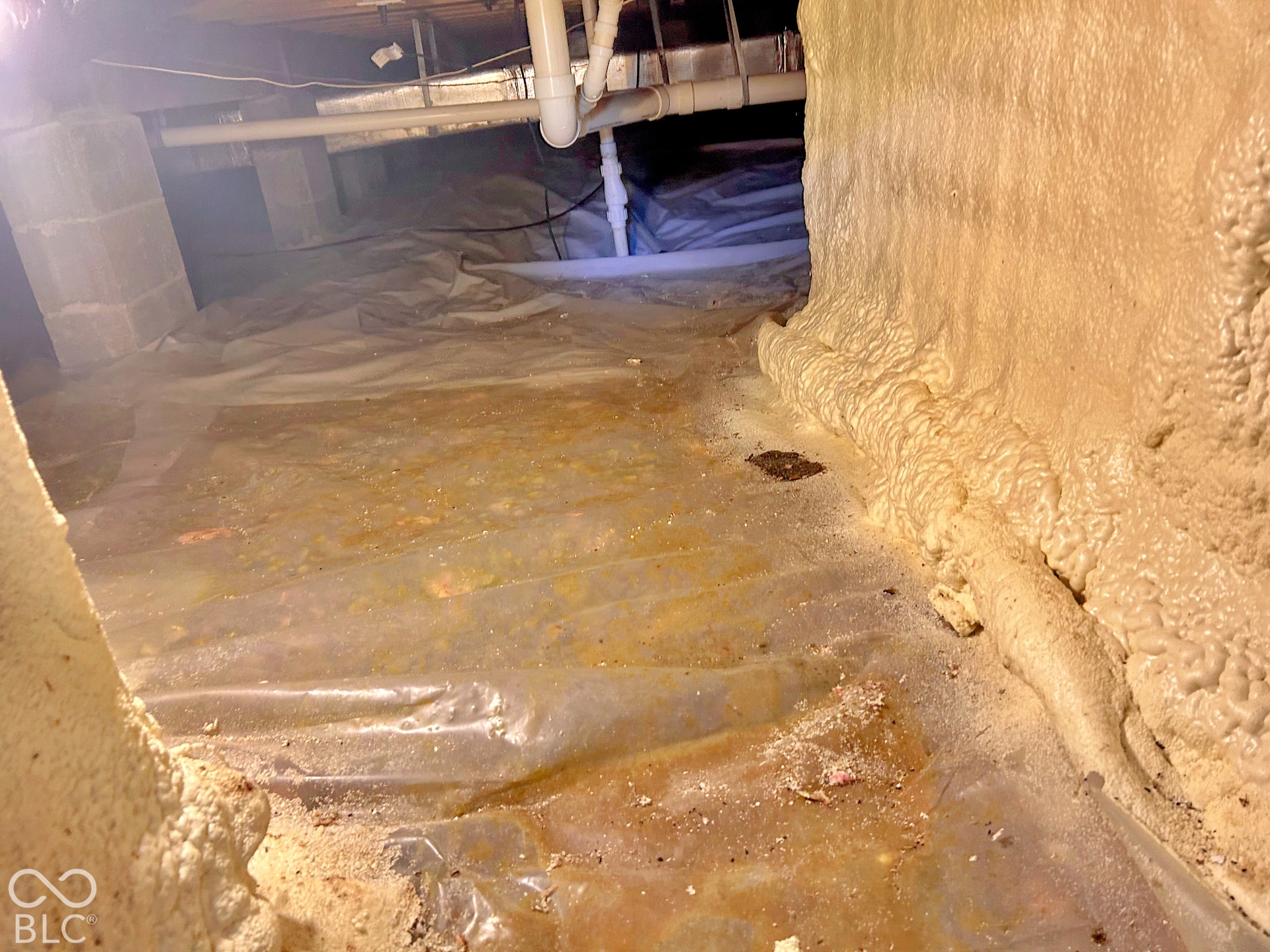 Encapsulated and spray foam insulated crawlspace.