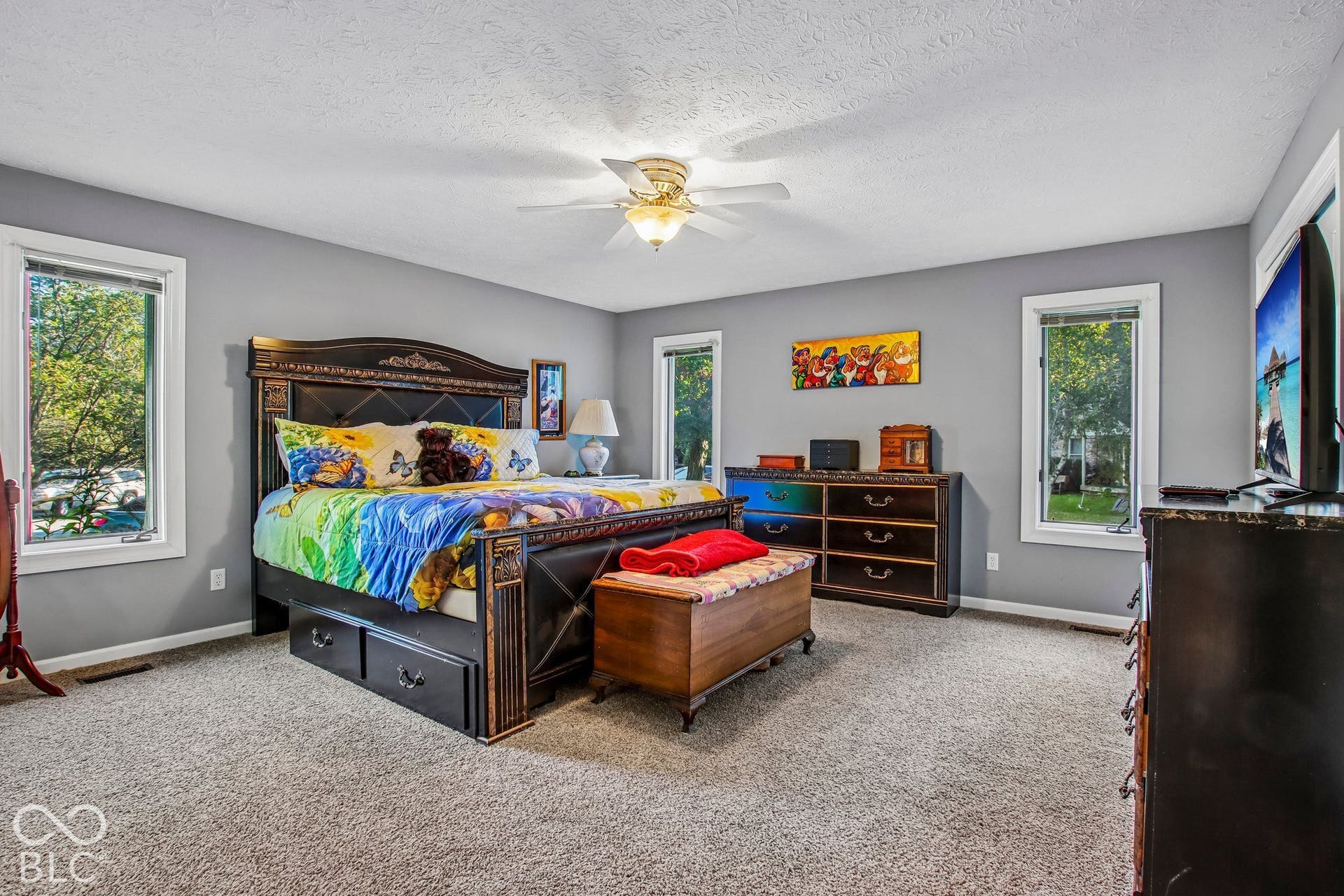 View of updated primary bedroom with 2 FULL closets