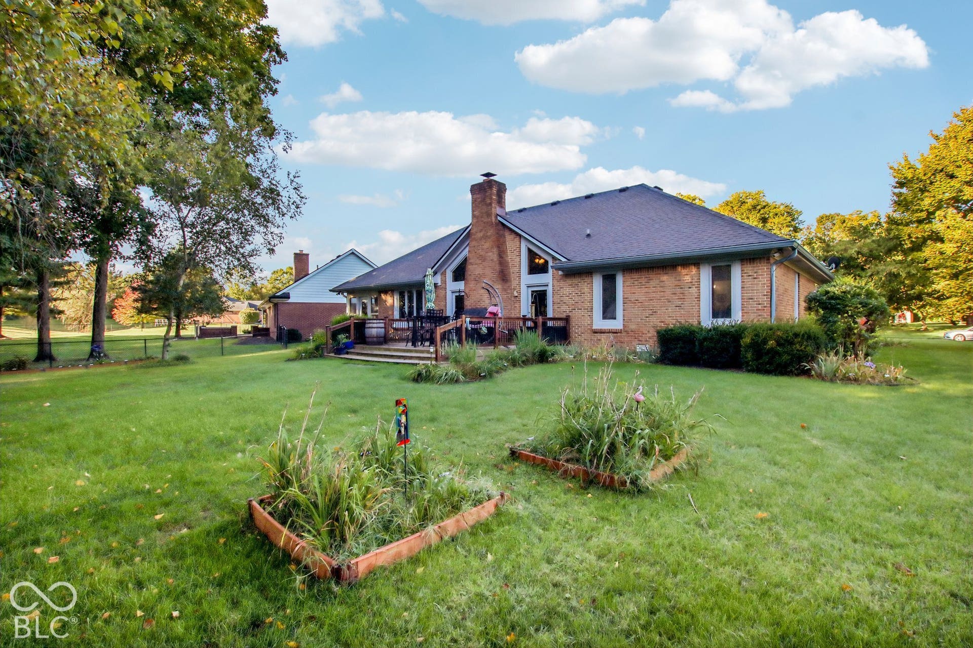 View of rear of home and back yard