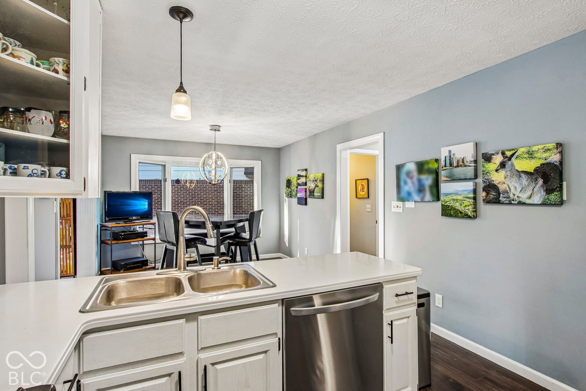 View of fully updated kitchen, dining area and bay window