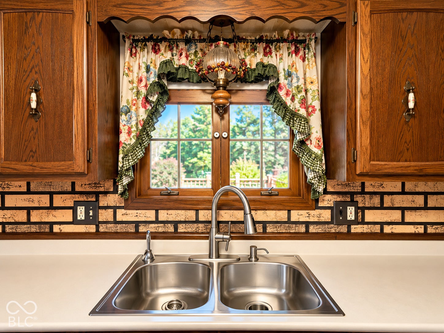 3680 S State Road 75, Coatesville, IN 46121 Double basin stainless steel sink with a gooseneck faucet