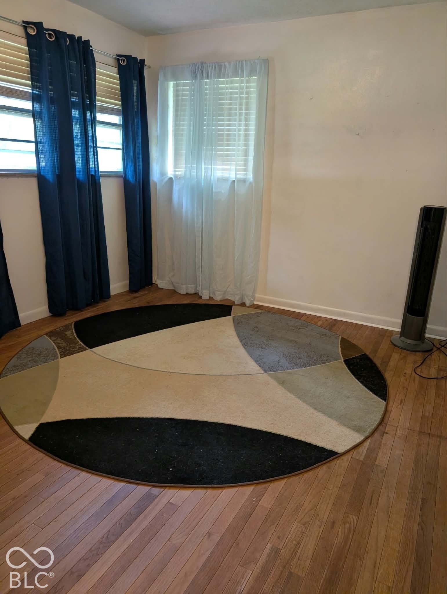 Bedroom 2 with original hardwood floors