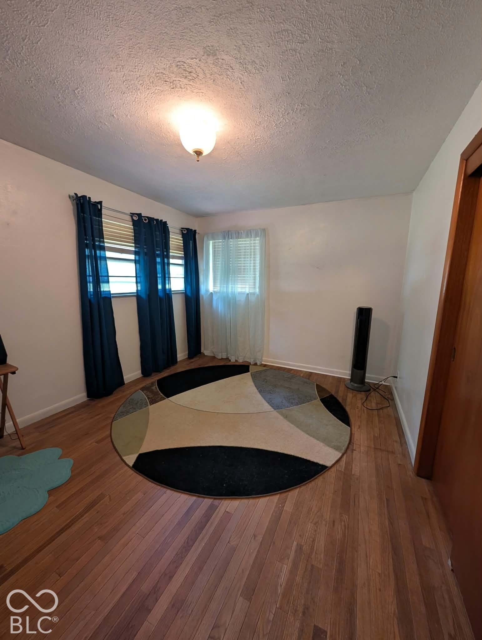 Bedroom 2 with original hardwood floors