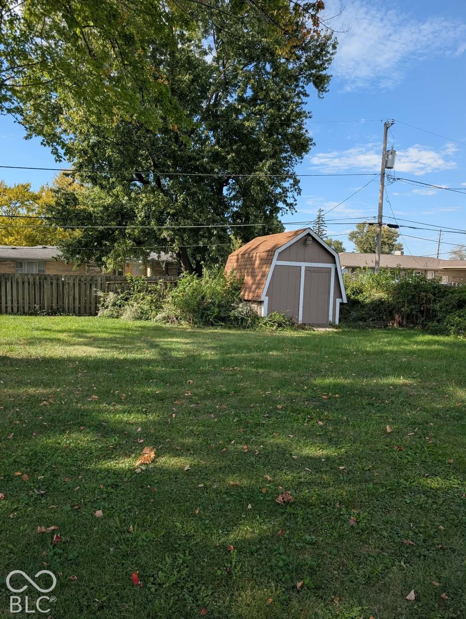 Backyard has 2 sheds!