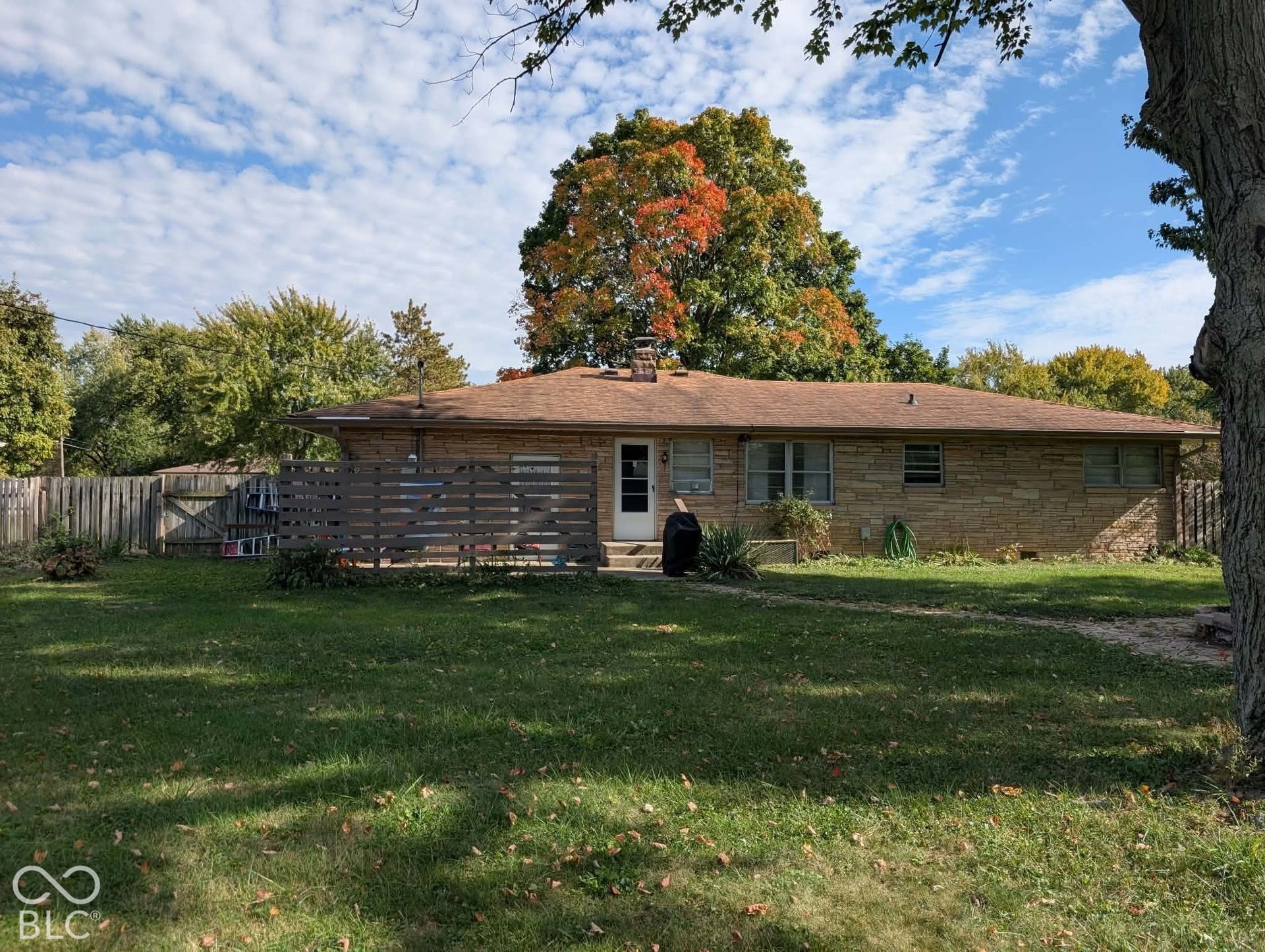 outstanding backyard with beautiful concrete patio for lots of summertime hangouts!