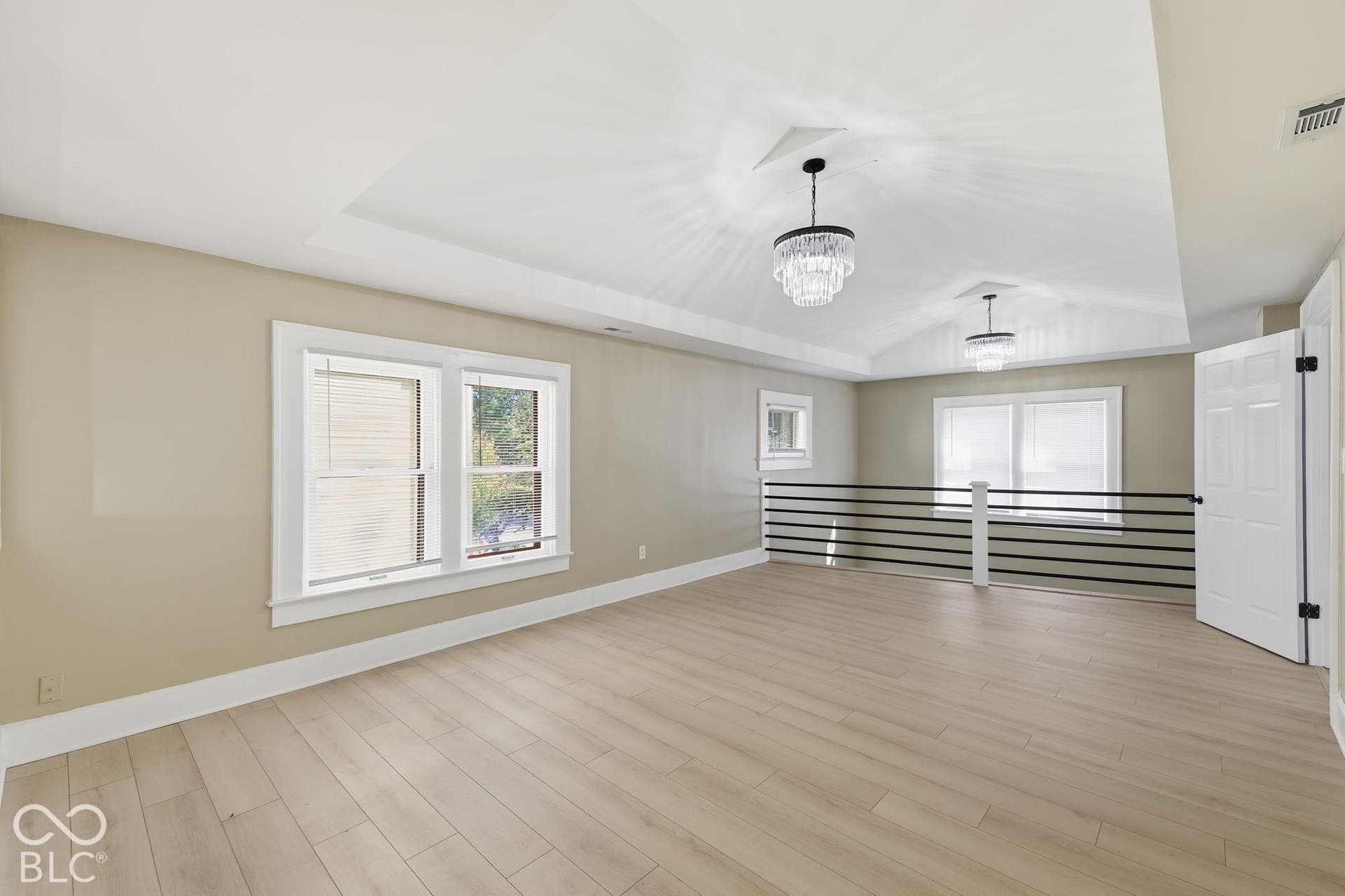 Vaulted ceiling with decorative light fixtures
