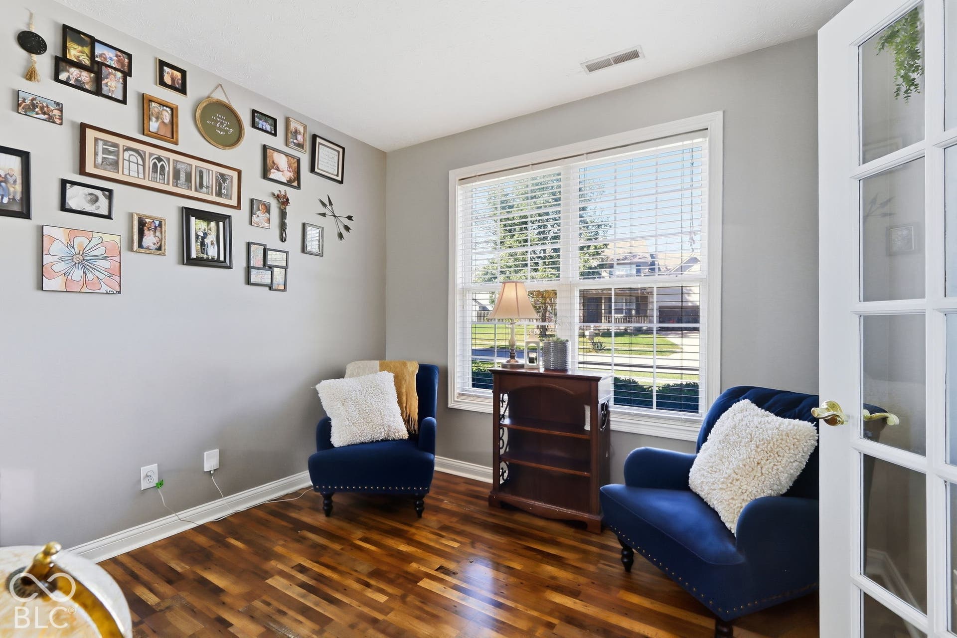8035 Meadow Bend Lane, Indianapolis, IN 46259 Wood-finish flooring, light gray wall paint, and white trim