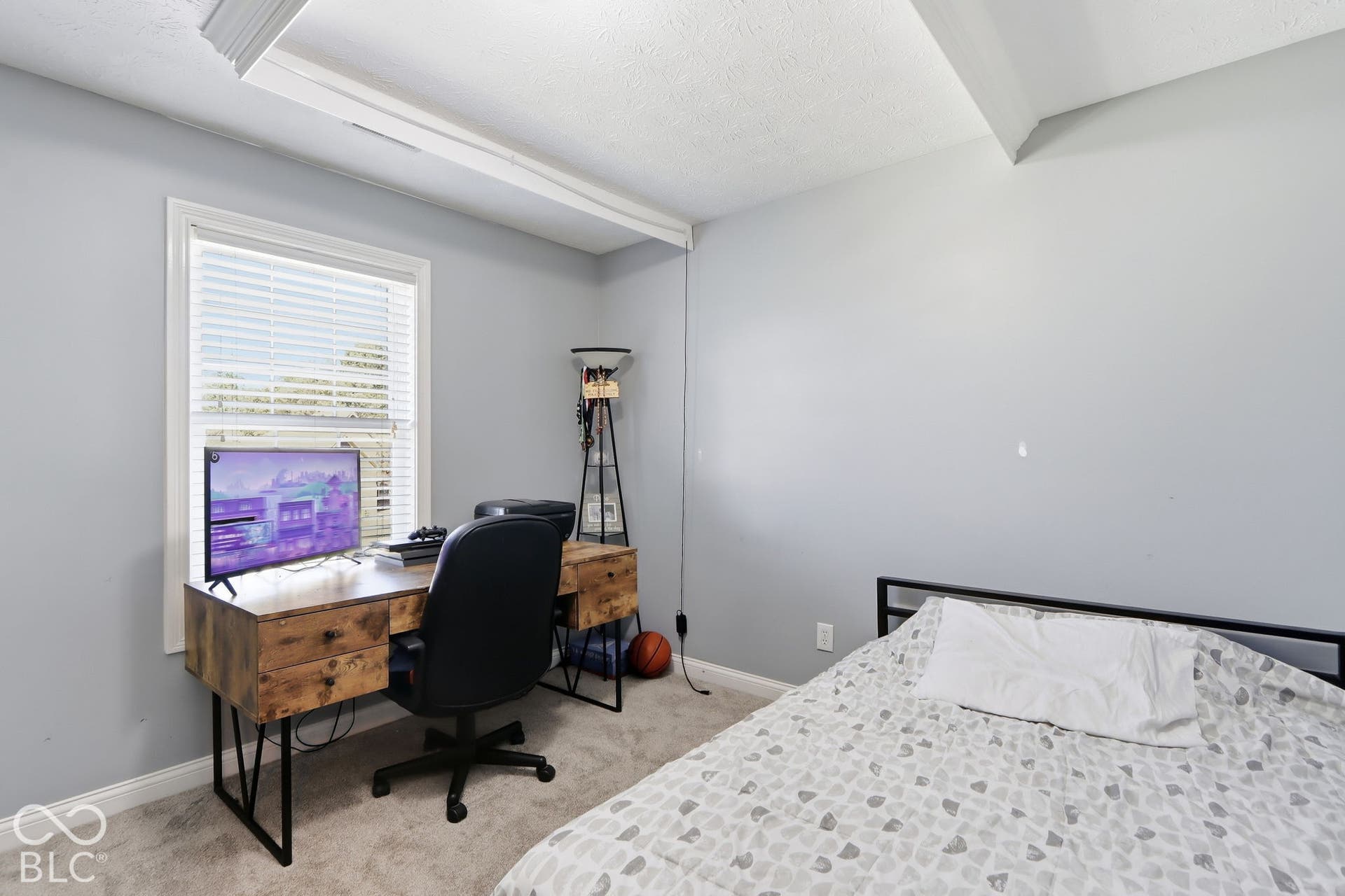 8035 Meadow Bend Lane, Indianapolis, IN 46259 Carpeted flooring, window with blinds, and white trim