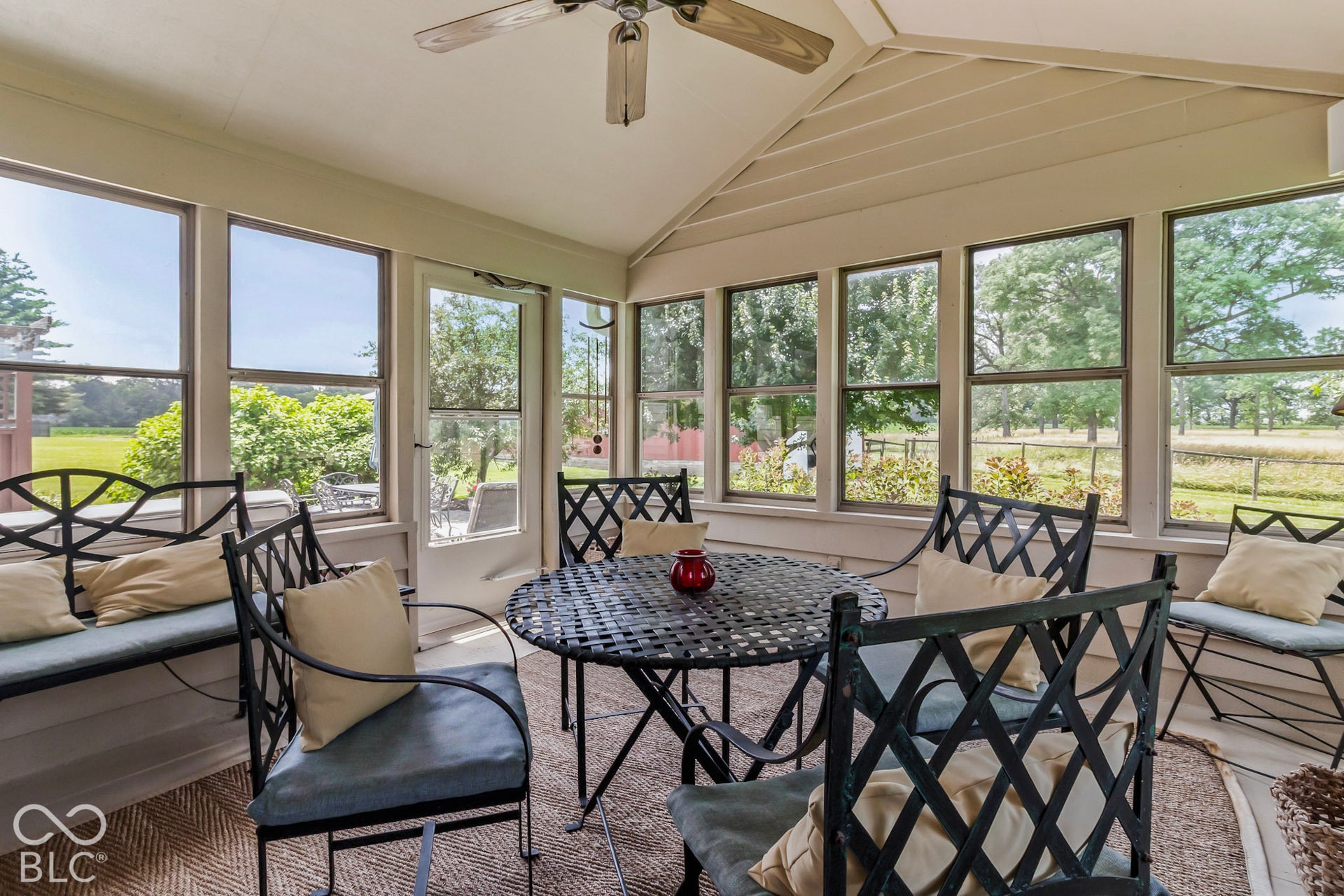 10954 N County Road 150 Road E, Pittsboro, IN 46167 Enclosed sunroom featuring a vaulted ceiling, ceiling fan, and extensive windows