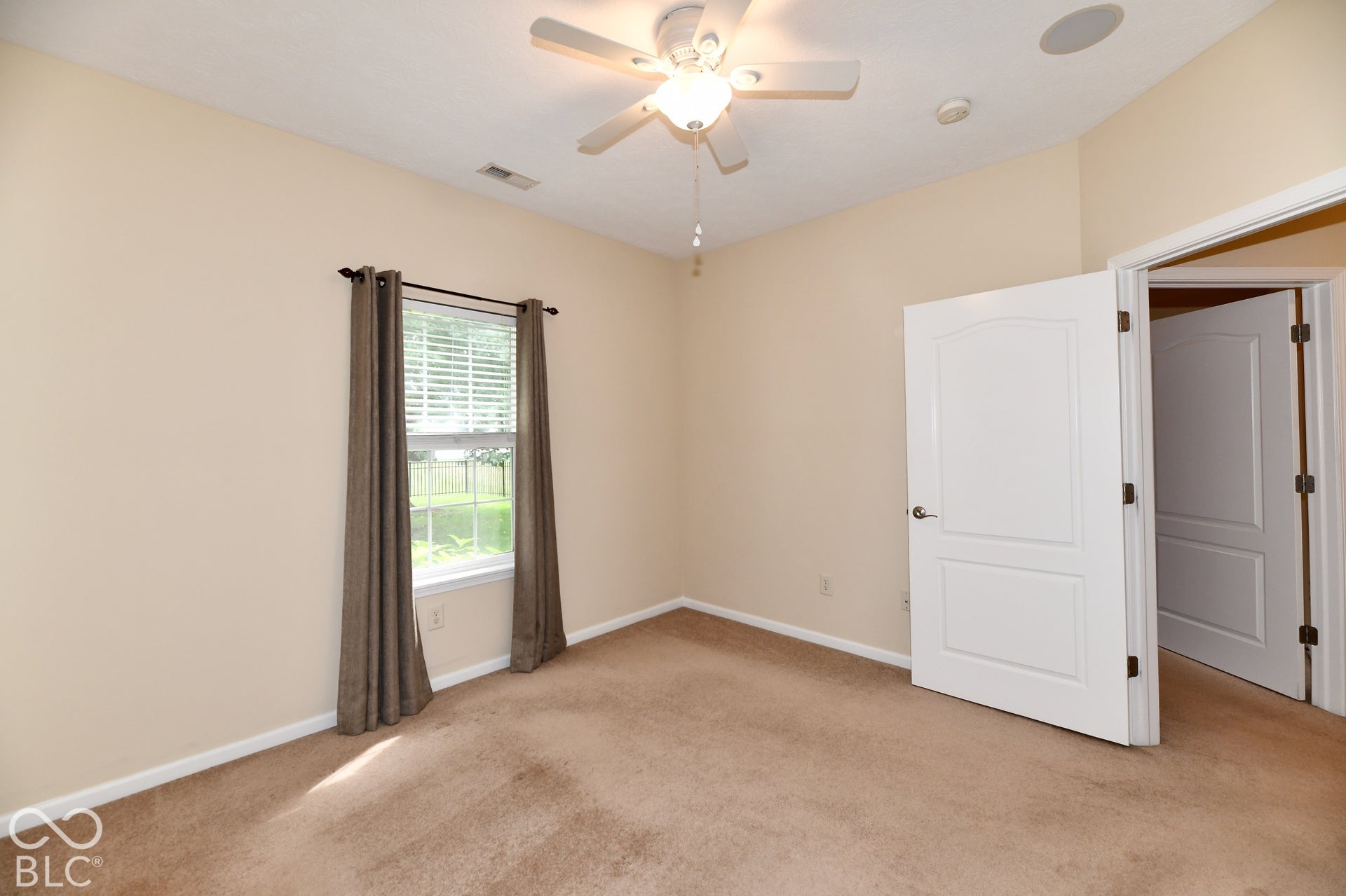 2nd Bedroom - carpeted, natural light and reach in closet, ceiling fan