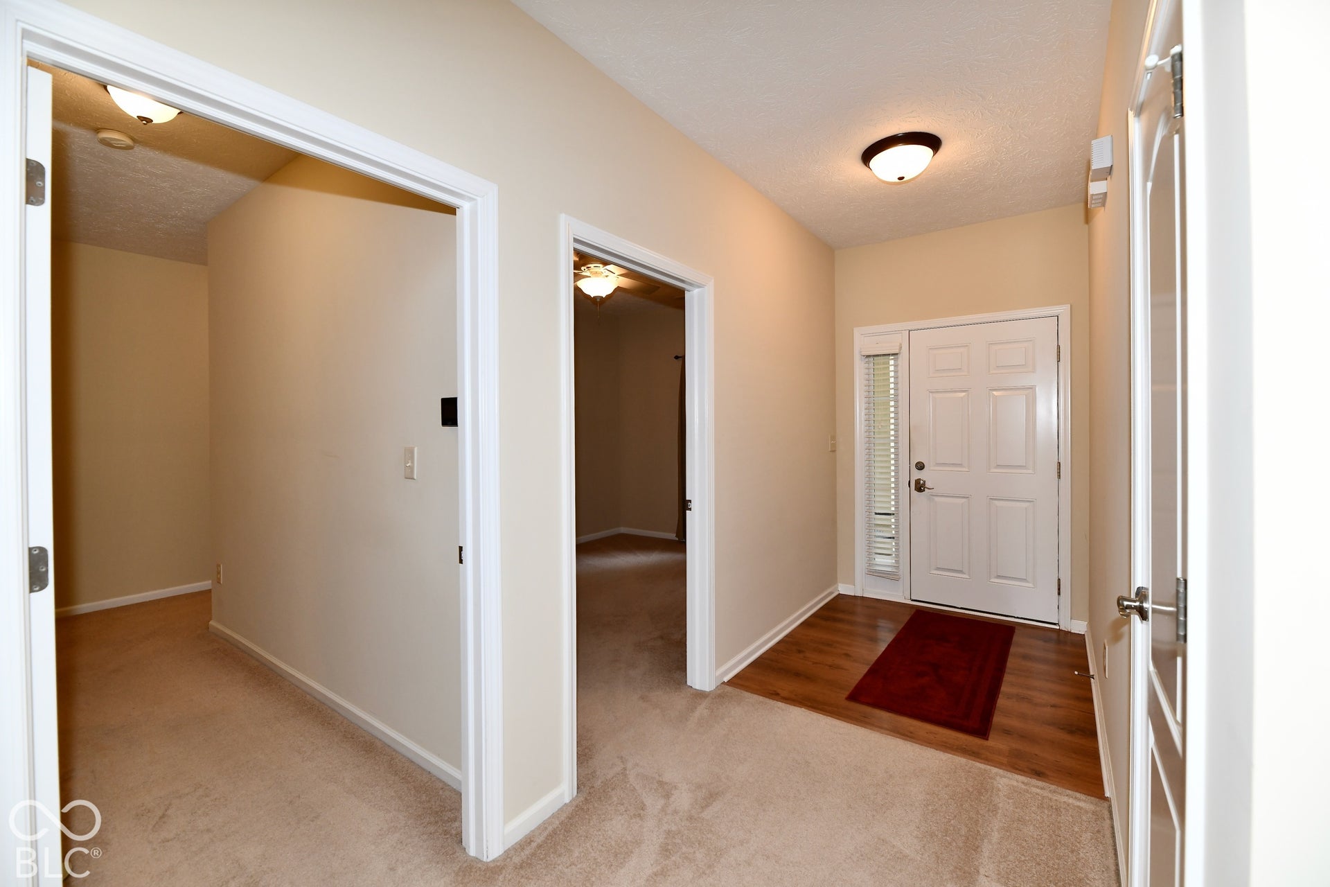 Entry with Office entrance doorway and looking into Bedroom area