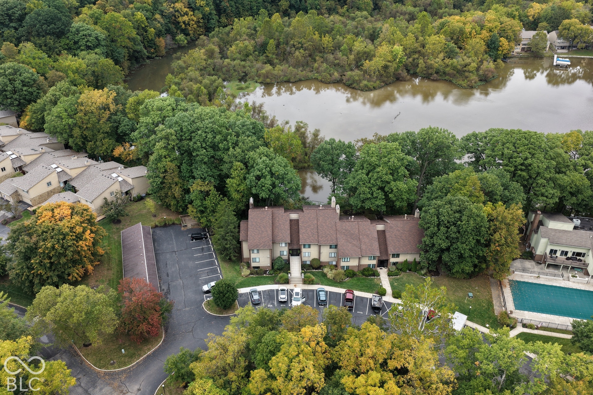 201 Bluffs Circle, Noblesville, IN 46062 Community featuring a water-front location, mature trees, an outdoor swimming pool, and dedicated parking