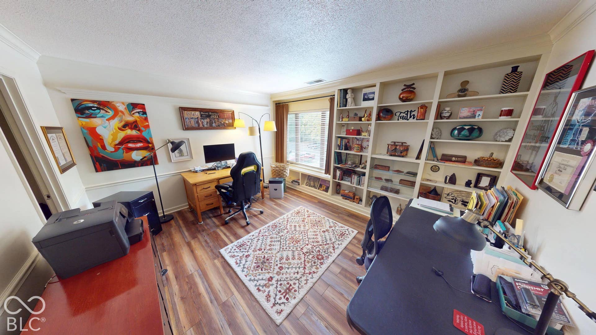 201 Bluffs Circle, Noblesville, IN 46062 BEDROOM #3 | Built-in shelving, wood-finish flooring, and crown molding