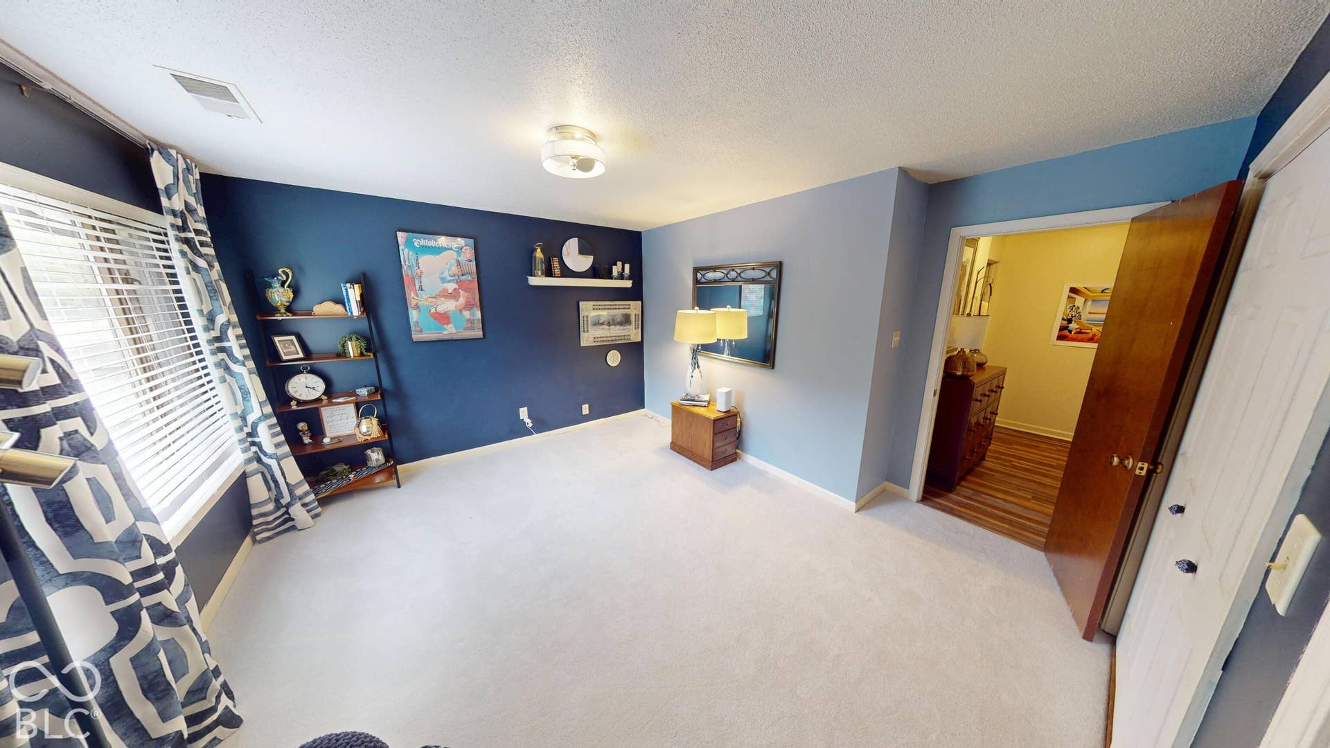 201 Bluffs Circle, Noblesville, IN 46062 BEDROOM #2 | Recessed window with blinds, built-in shelving, carpet flooring, and flush mount lighting