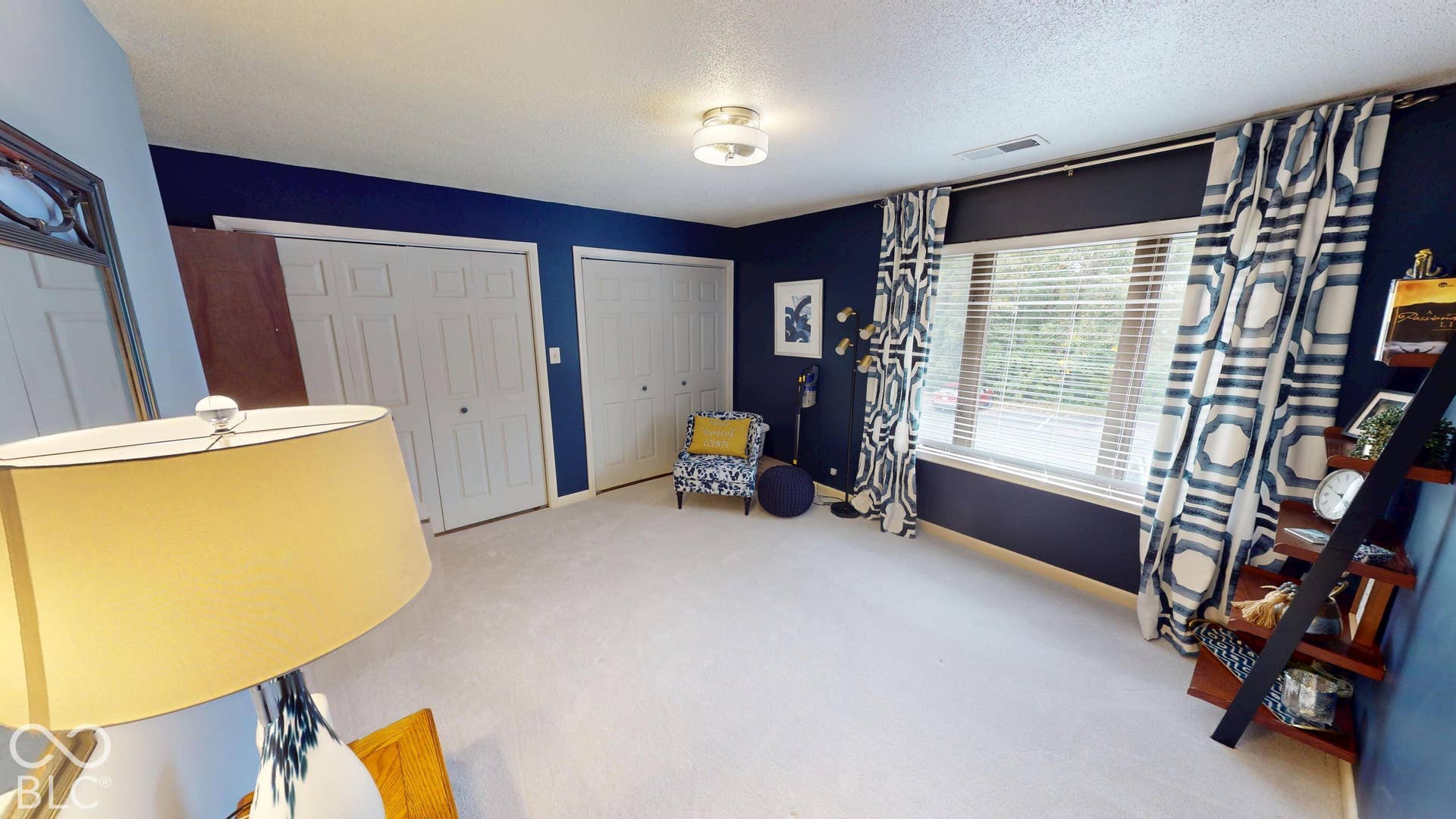 201 Bluffs Circle, Noblesville, IN 46062 BEDROOM #2 | Recessed window with blinds, two panel closet doors, and overhead lighting