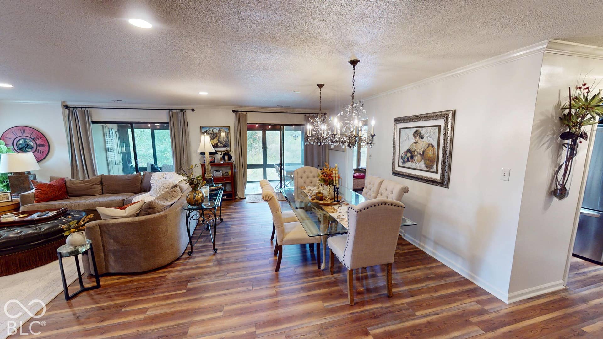 201 Bluffs Circle, Noblesville, IN 46062 Wood-finish flooring throughout, recessed ceiling lighting, crown molding, and two glass sliding doors