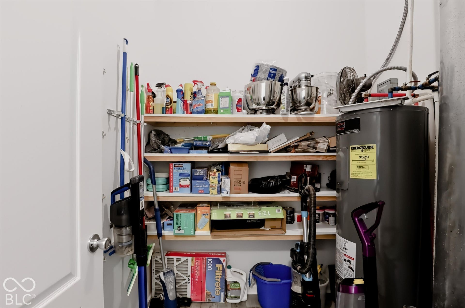 The mudroom is tucked behind the kitchen, near the garage entrance. I can envision several creative ways to increase the functionality and gain even more storage.