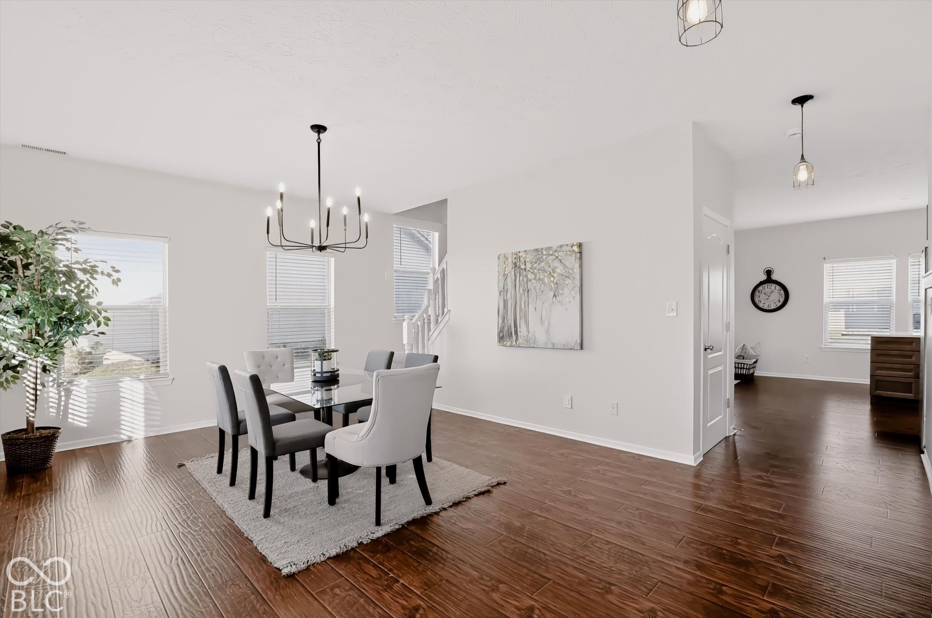 Look left of the table to access the stairs that lead you to the family room and upstairs.